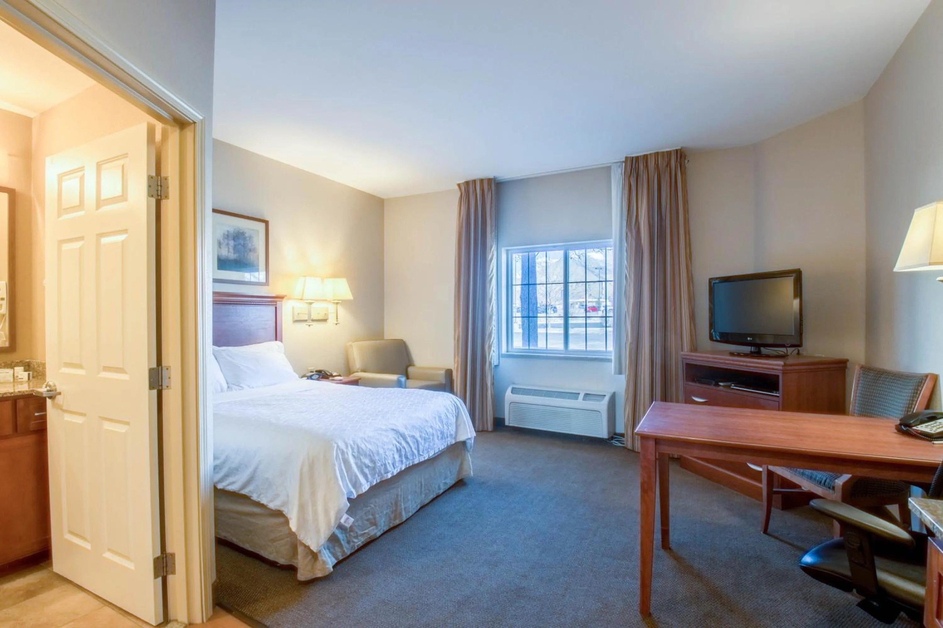 Bed in Western Slope Suites Parachute