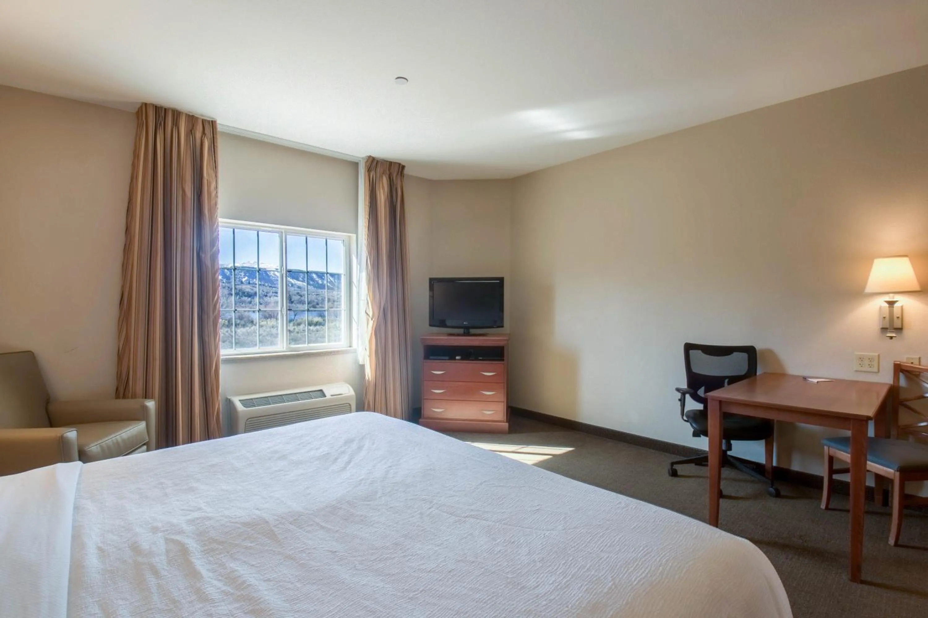 Bed in Western Slope Suites Parachute