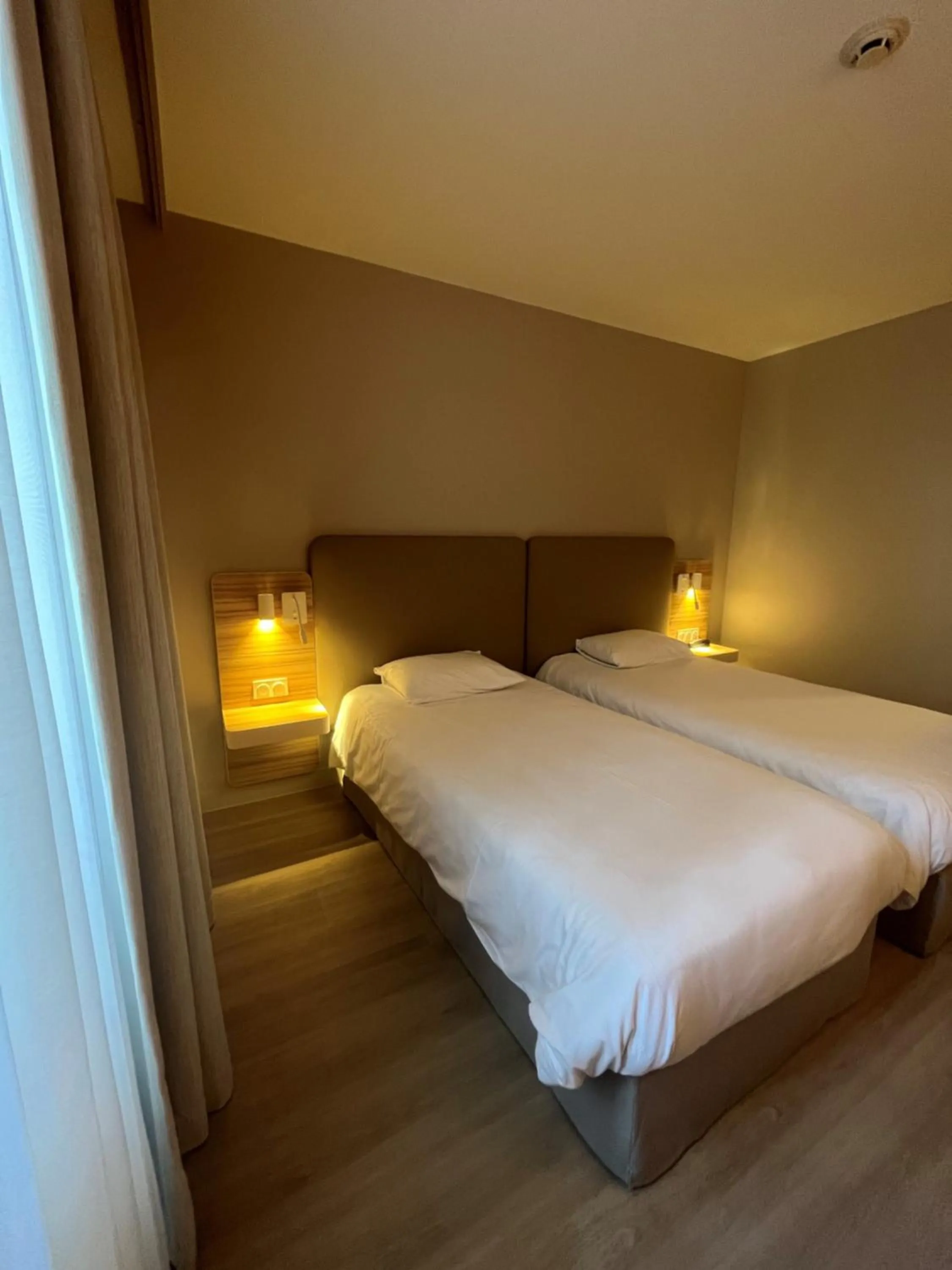 Bed in Hôtel de l'Abbaye des Prémontrés