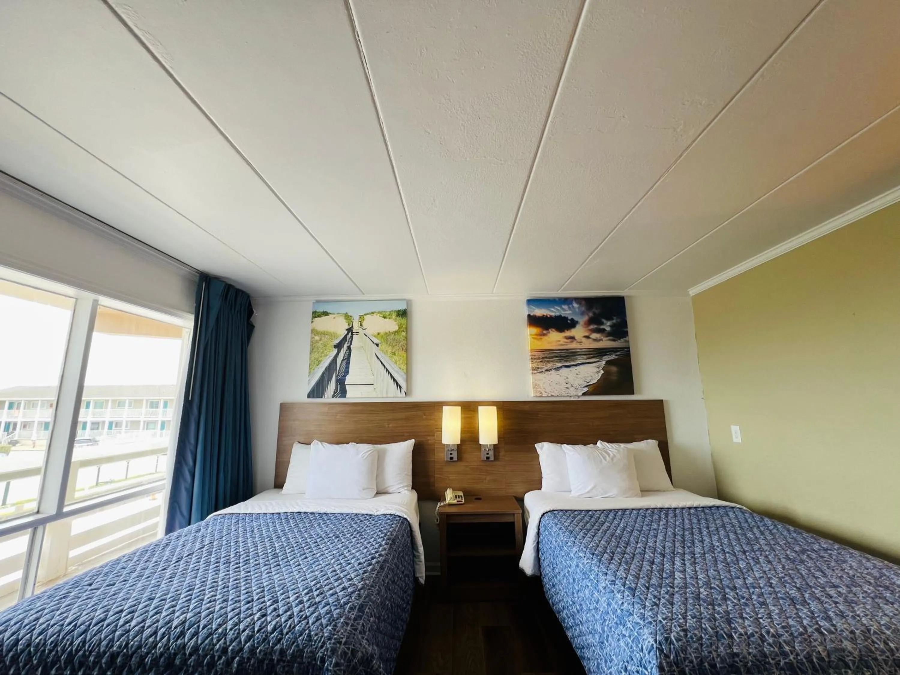 Bed in Mariner Inn And Suites