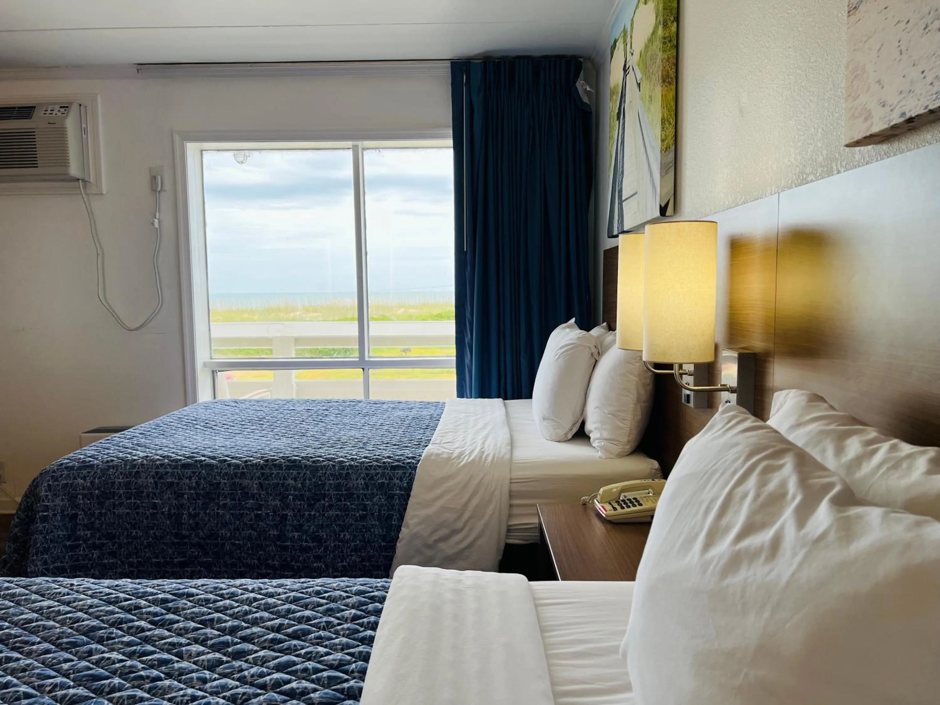 Bed in Mariner Inn And Suites