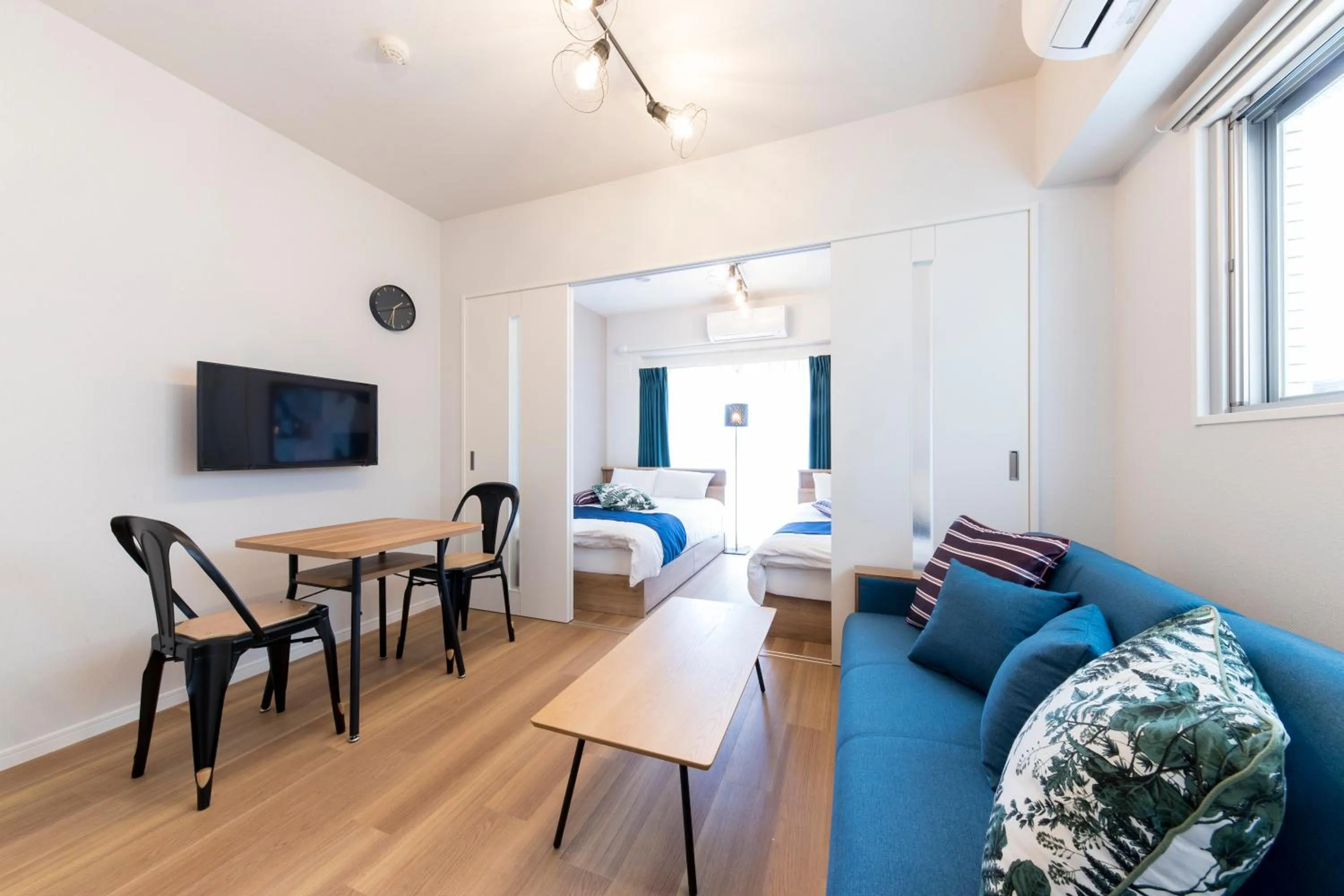 Living room, Bed in SG RESIDENCE INN HAKATA