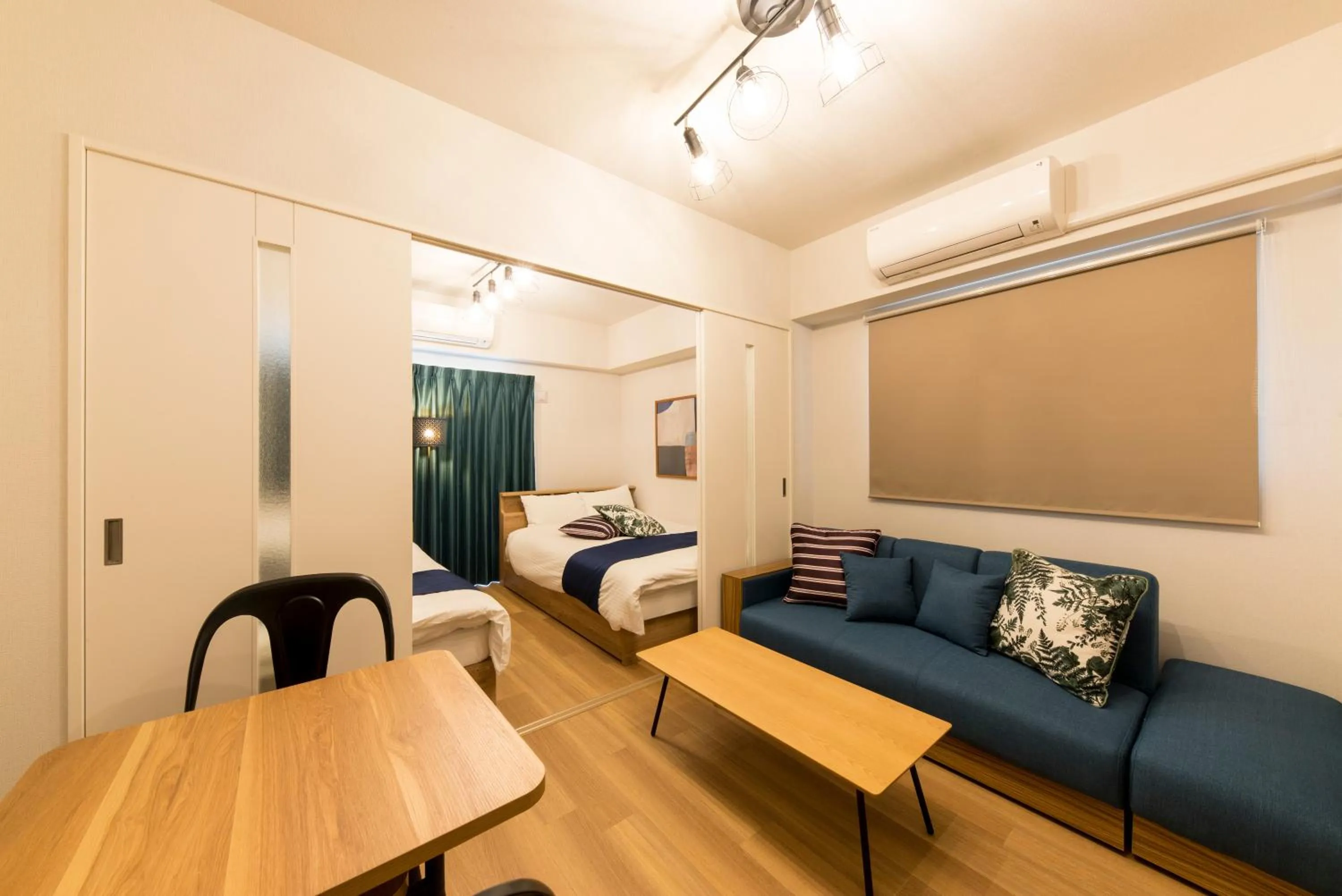 Living room, Bed in SG RESIDENCE INN HAKATA