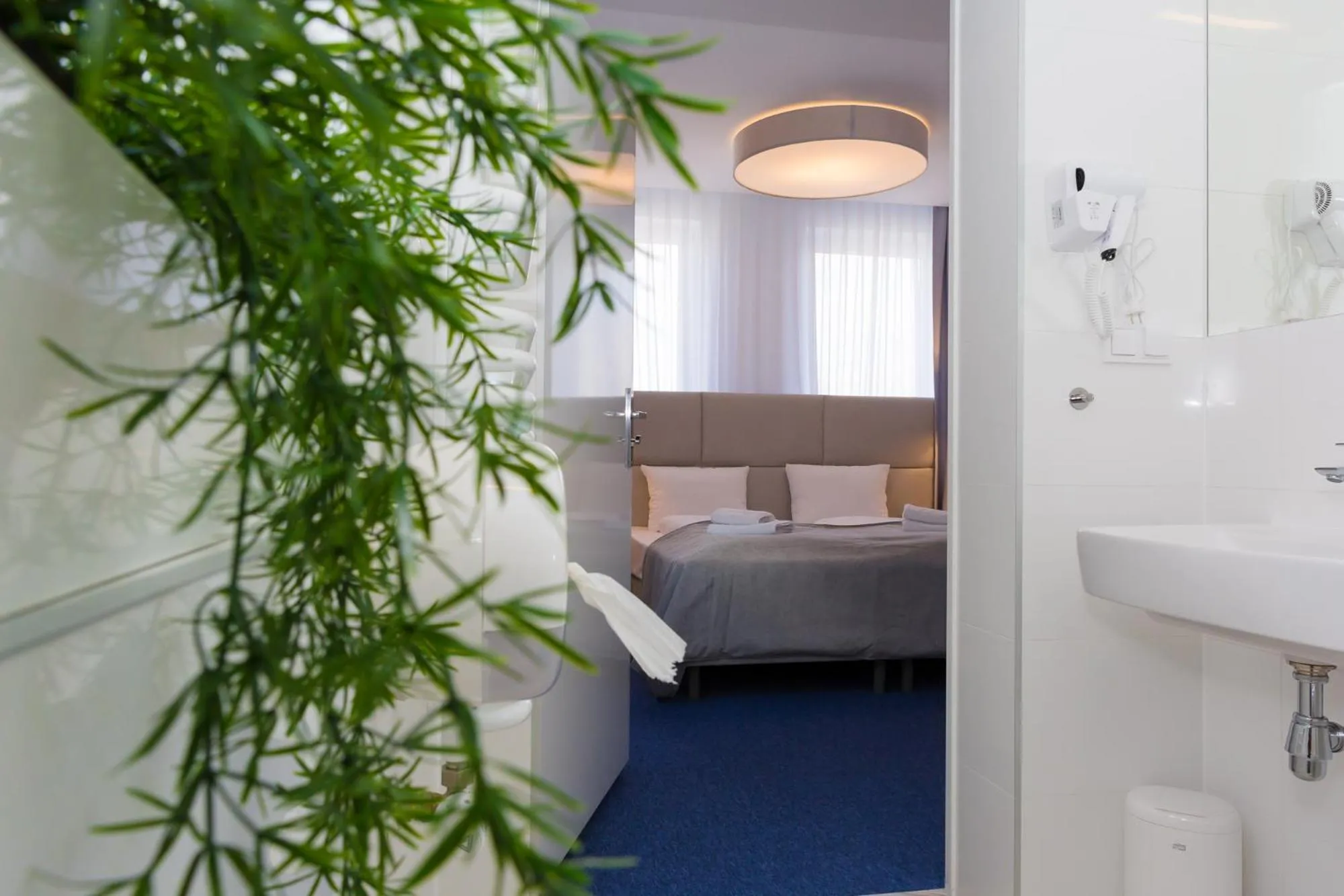 Bed in Hotel Quattro