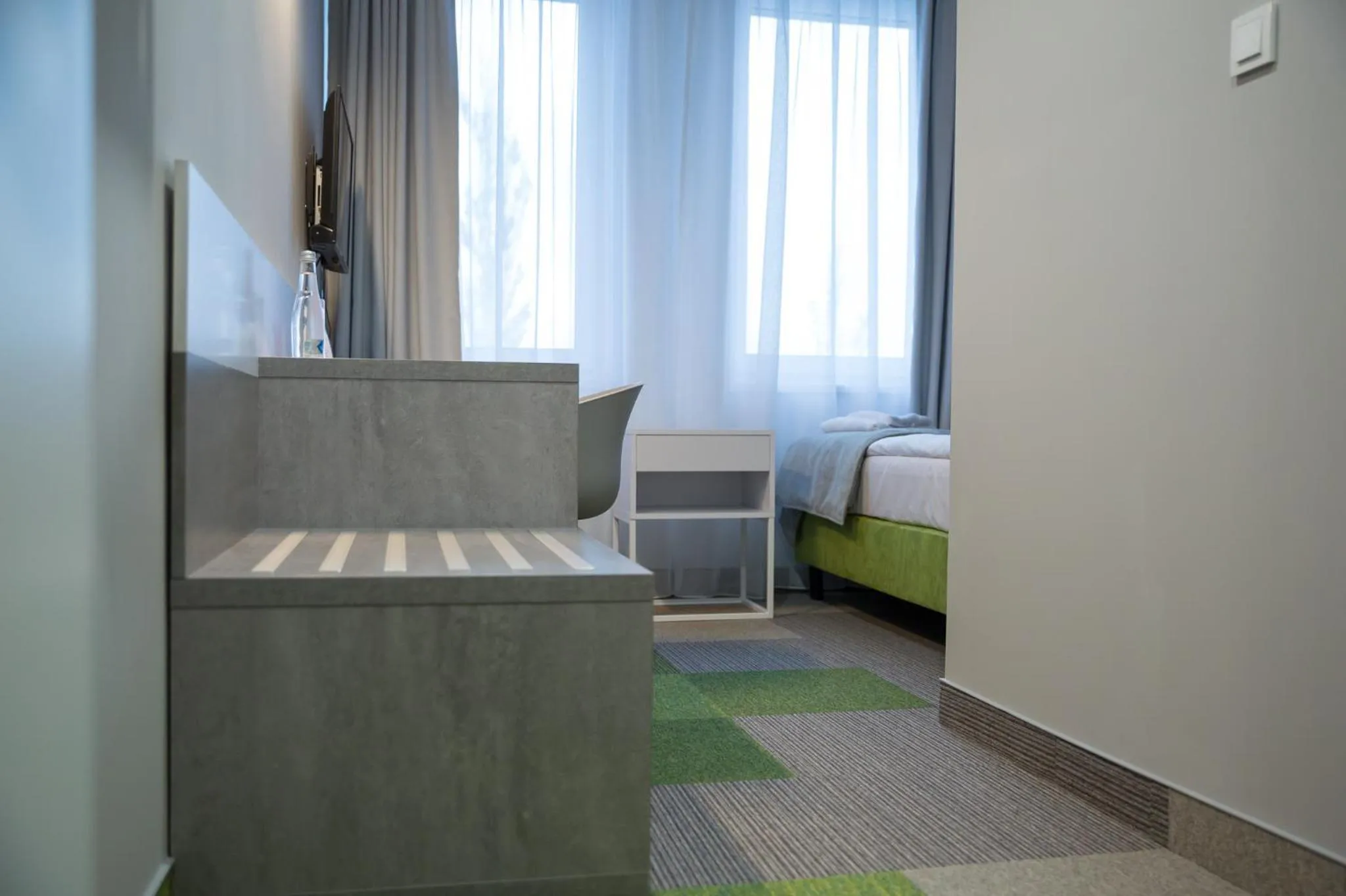 Bed in Hotel Quattro