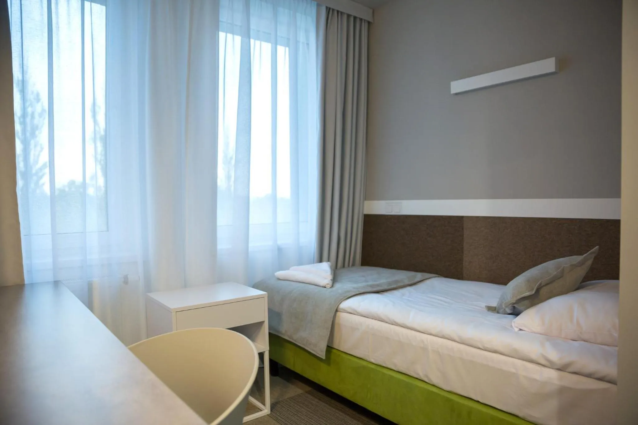 Bed in Hotel Quattro