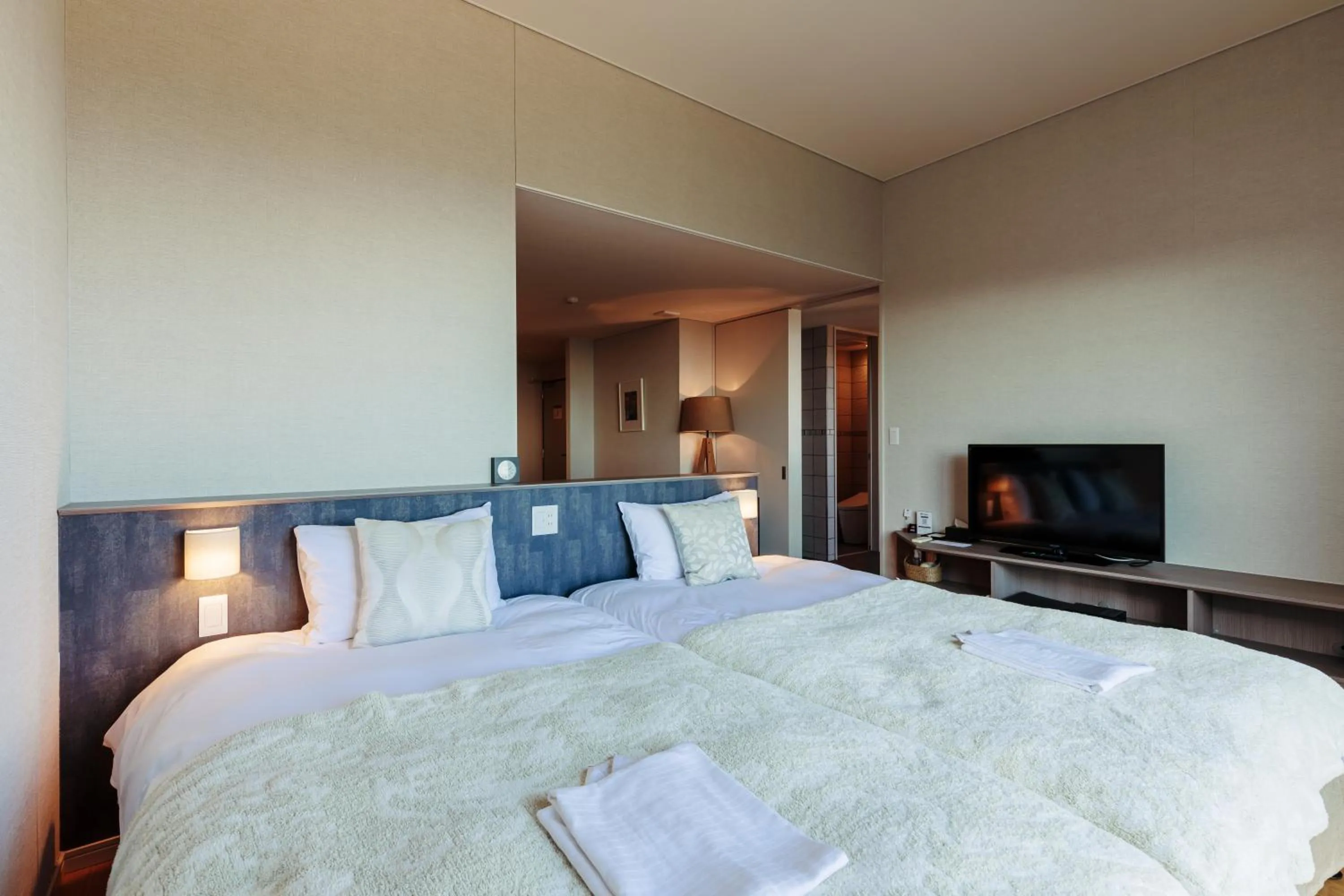 Bed in the salon 伊豆高原 Hotels & Resort