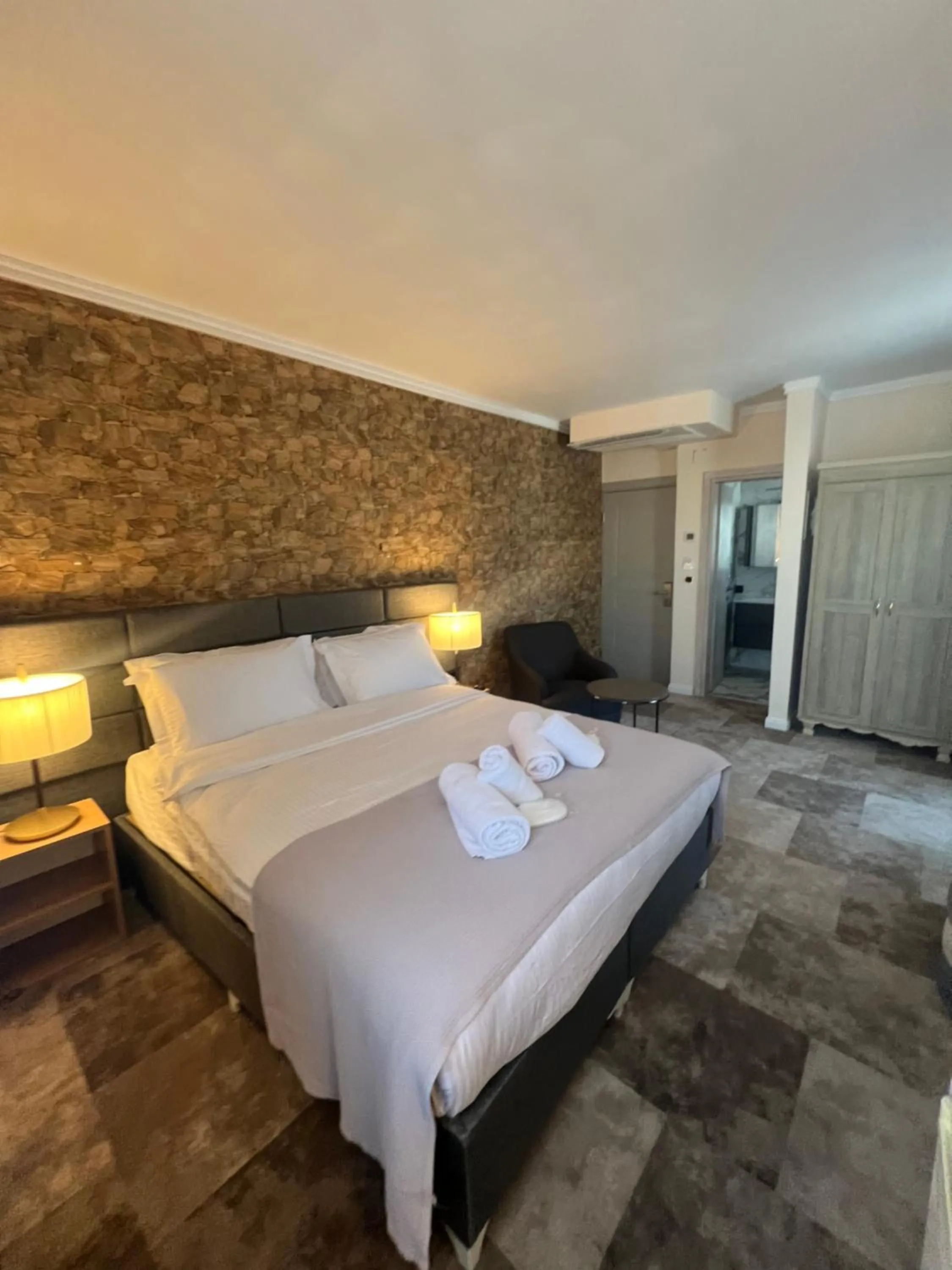 Bedroom, Bed in Lighthouse Hotel