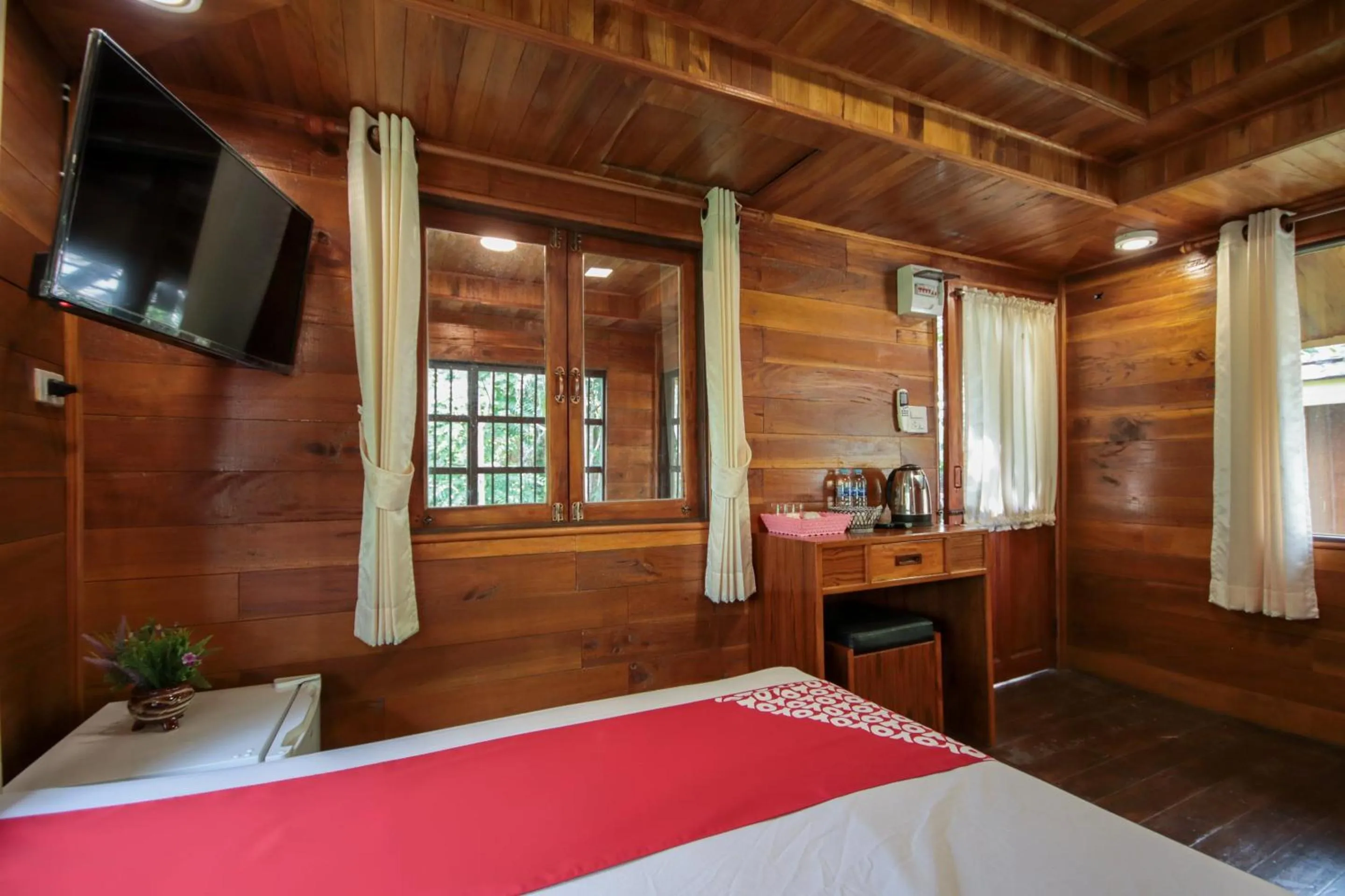 Bedroom in OYO 604 Ruen Mai Horm Resort