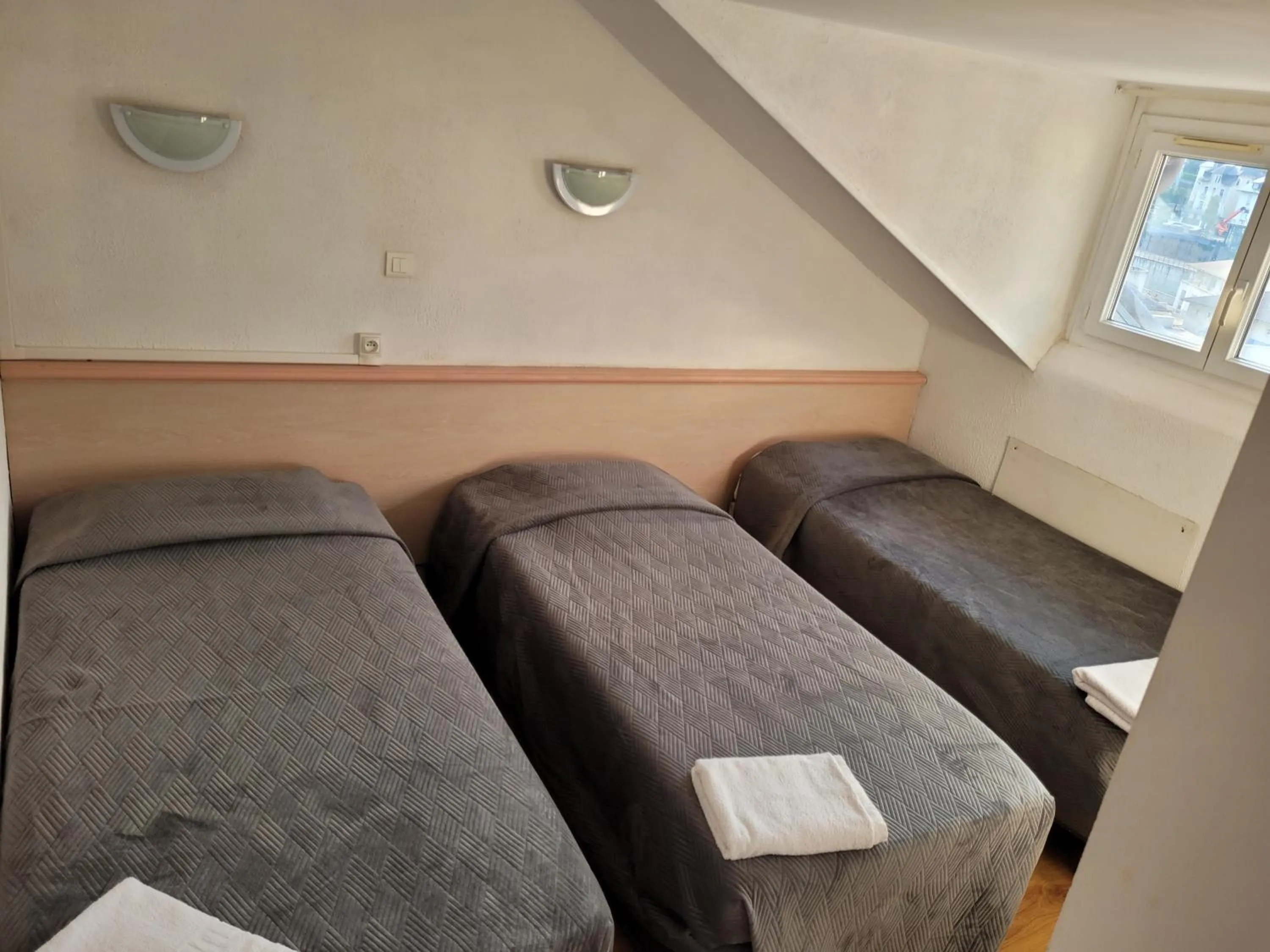 Bedroom in Hôtel Marquette