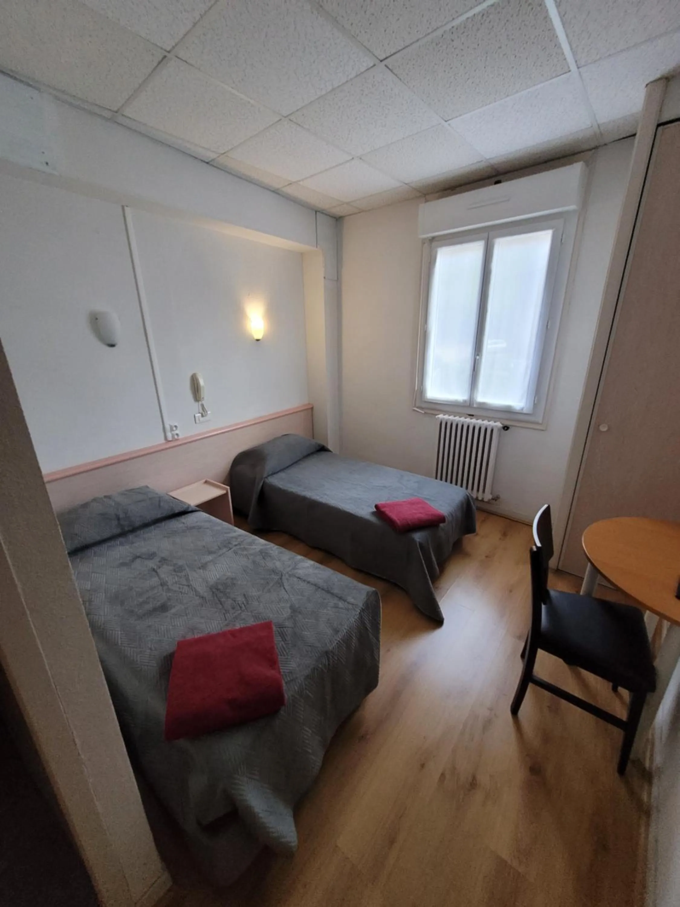 Bedroom in Hôtel Marquette