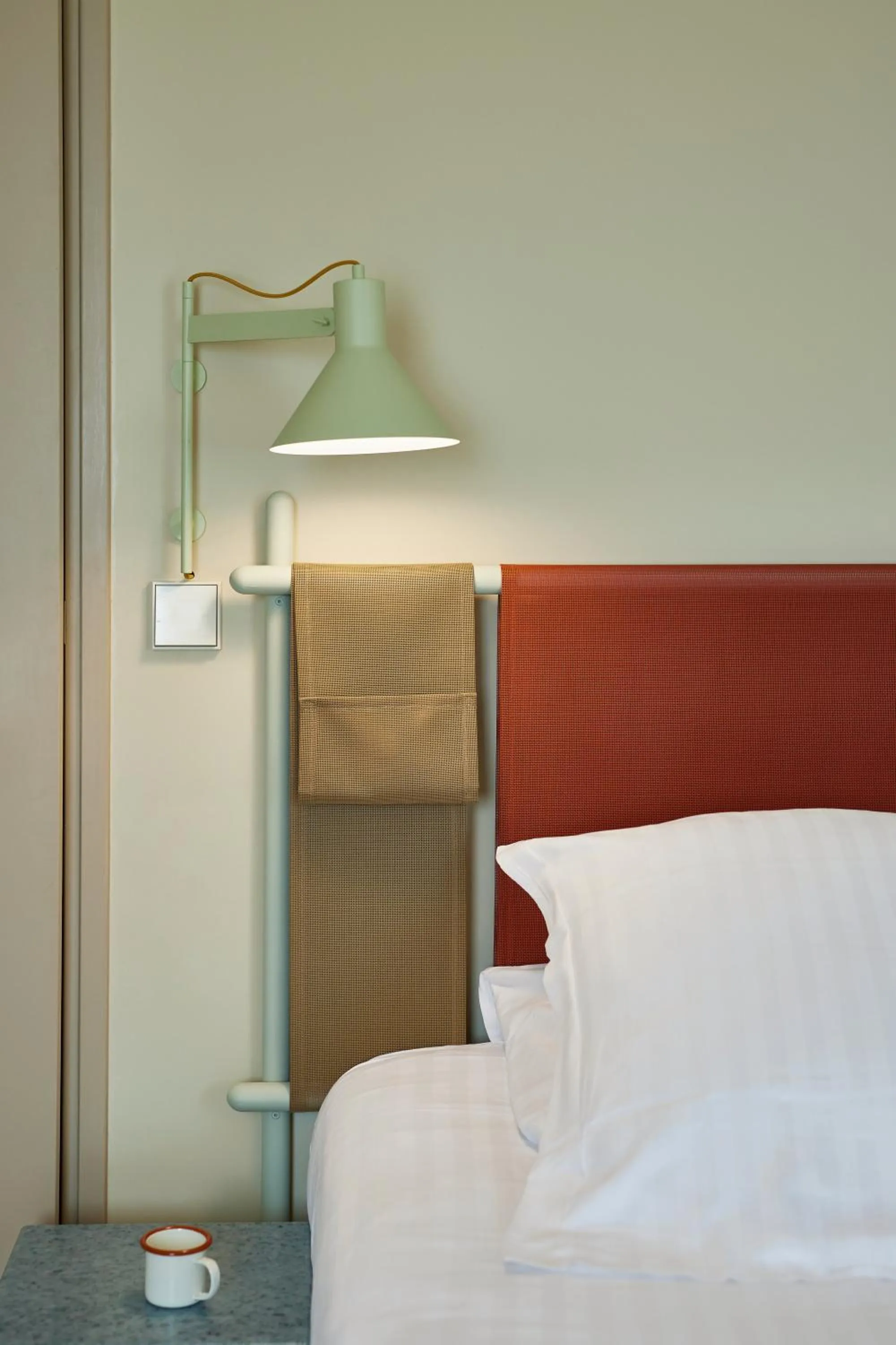Bed in Kyriad Hotel Cannes Mandelieu