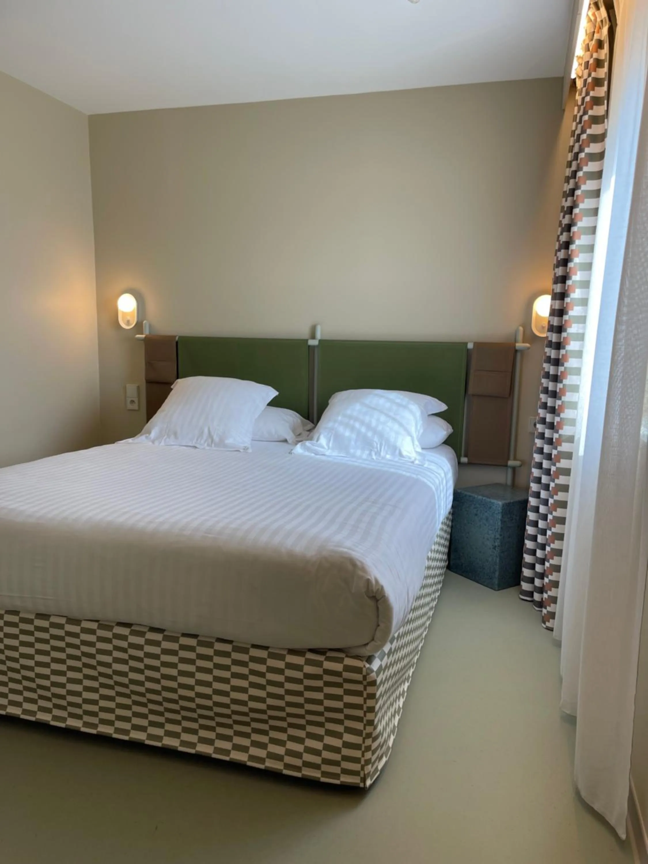 Photo of the whole room, Bed in Kyriad Hotel Cannes Mandelieu
