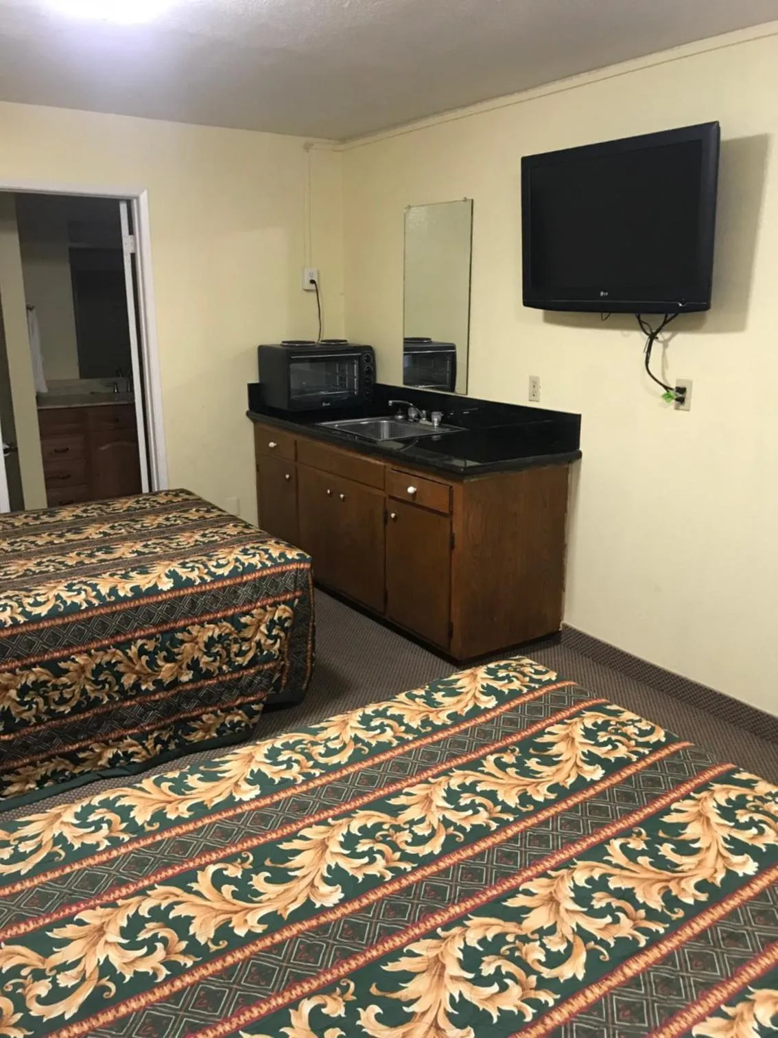 Bed in Hacienda Motel