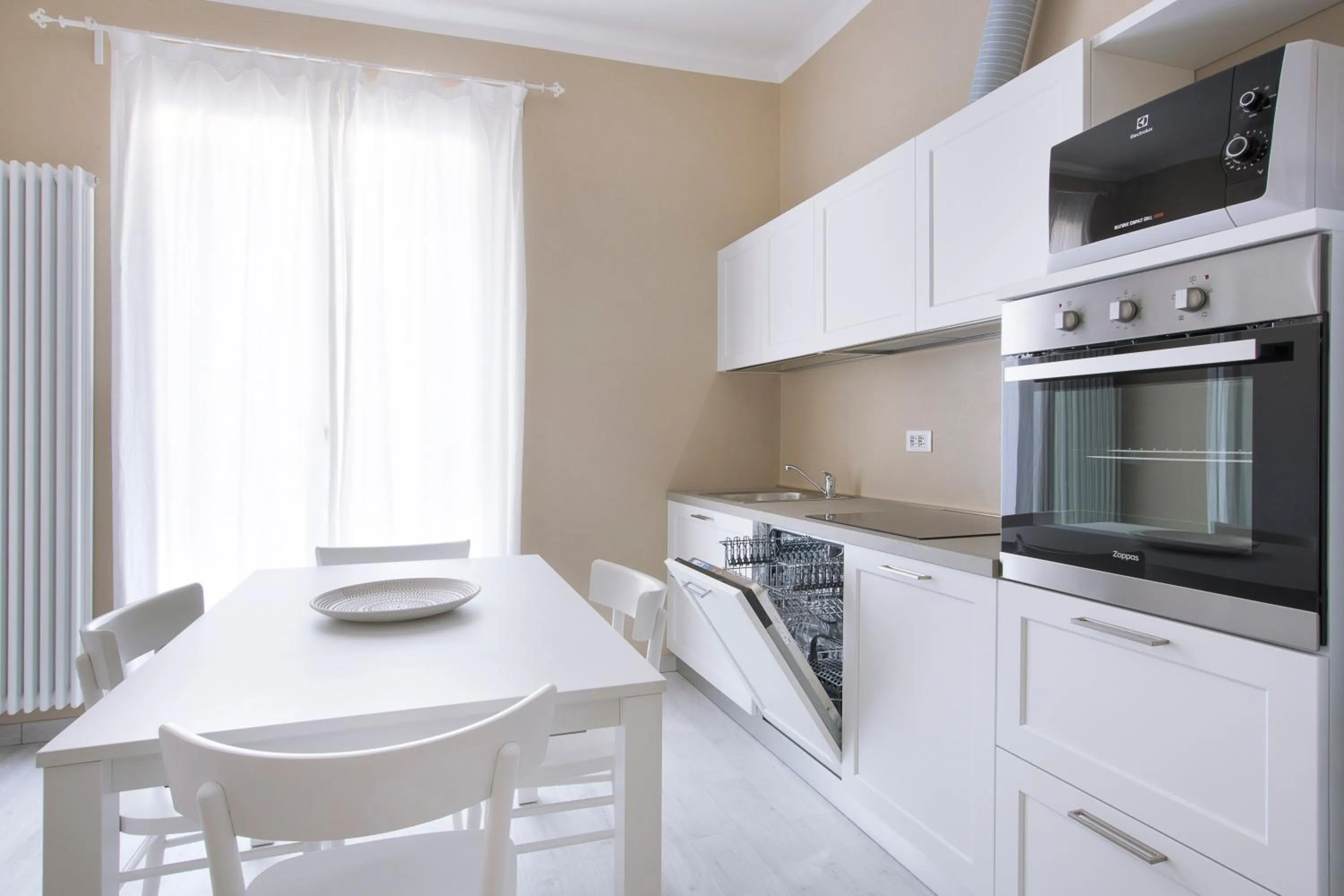 Kitchen or kitchenette in Residence Serenella - Dependance