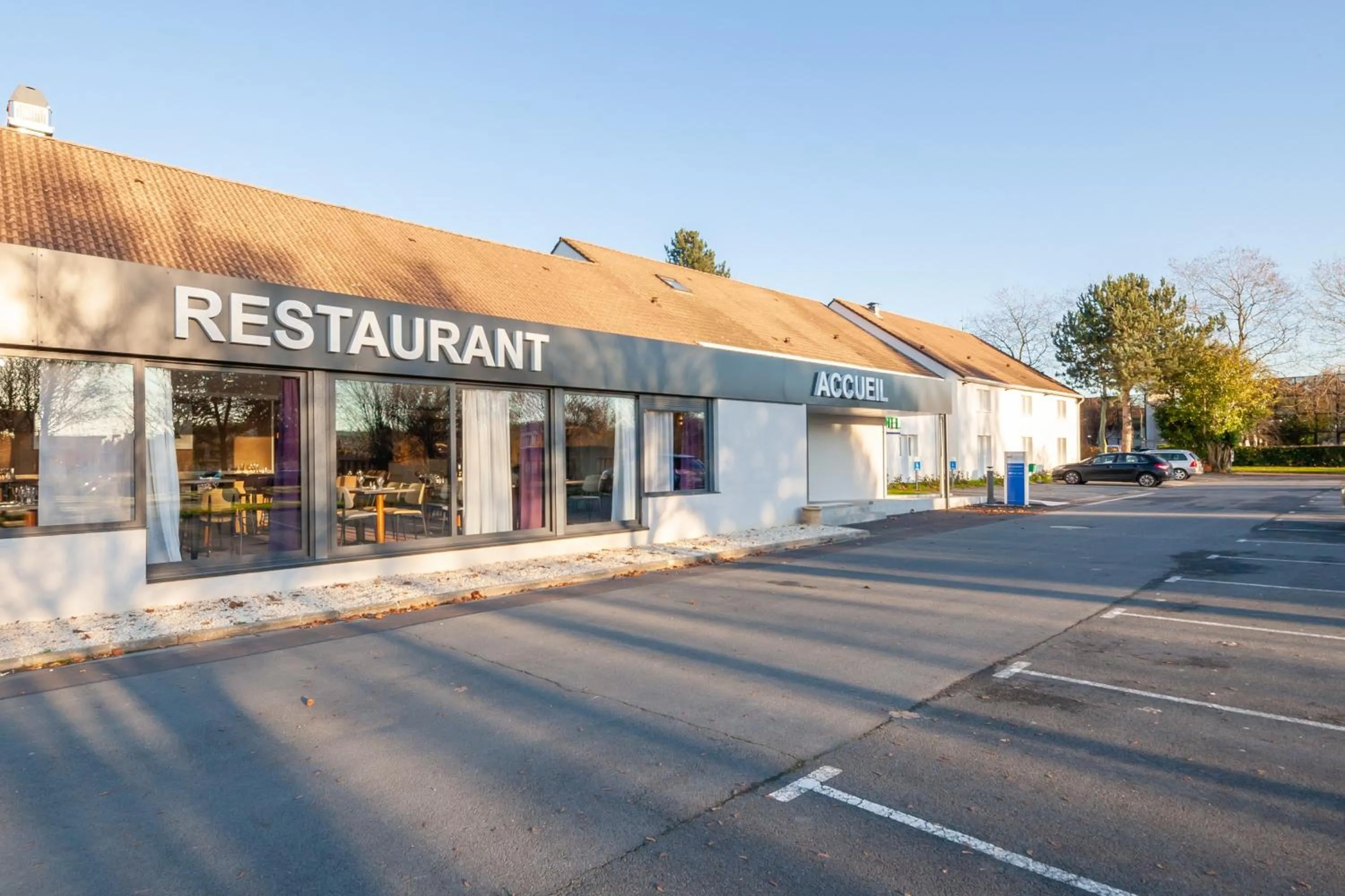 Property building in Brit Hotel Caen Nord - Mémorial