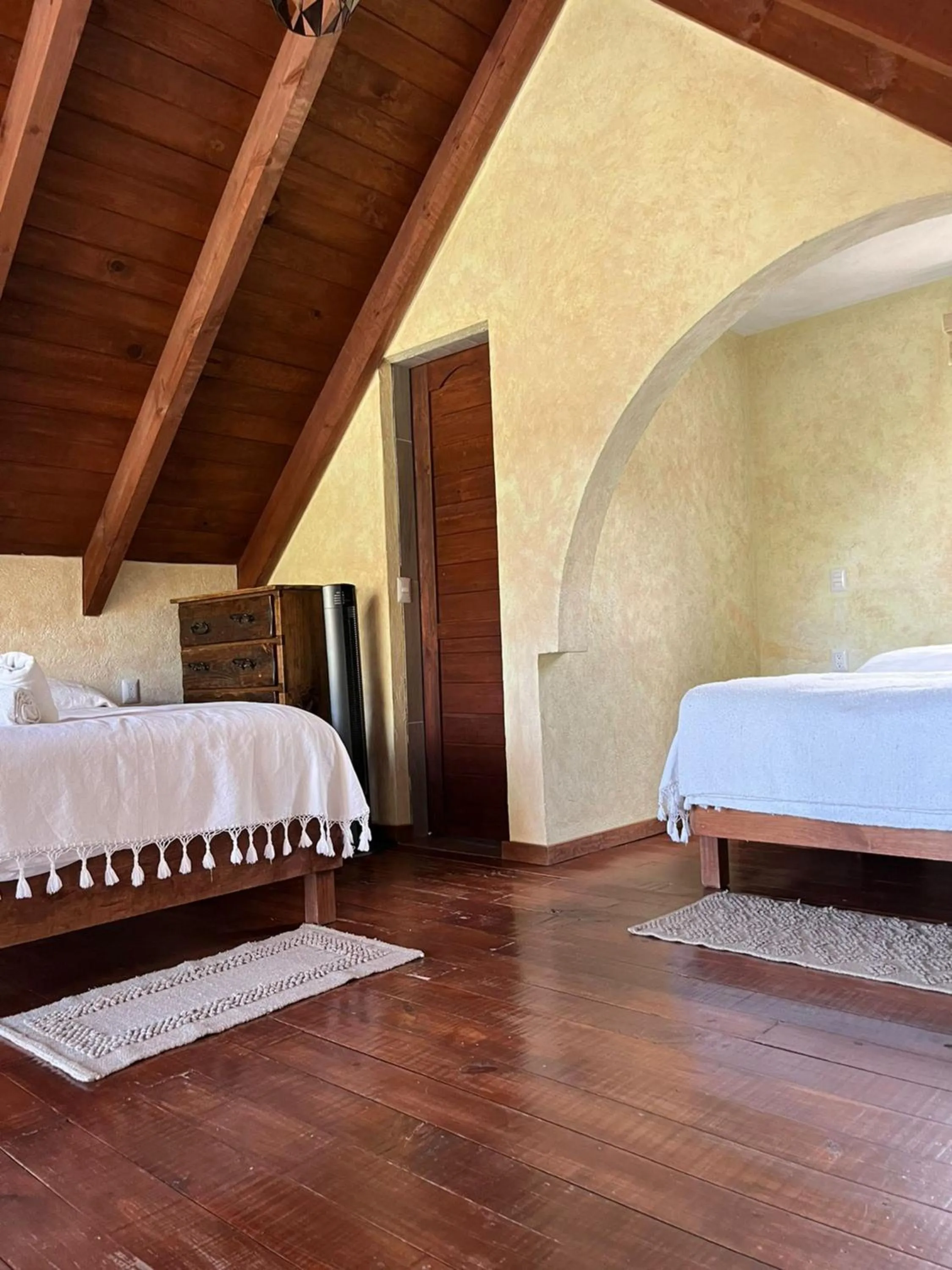 Bed in Zidada Hotel and Chalets