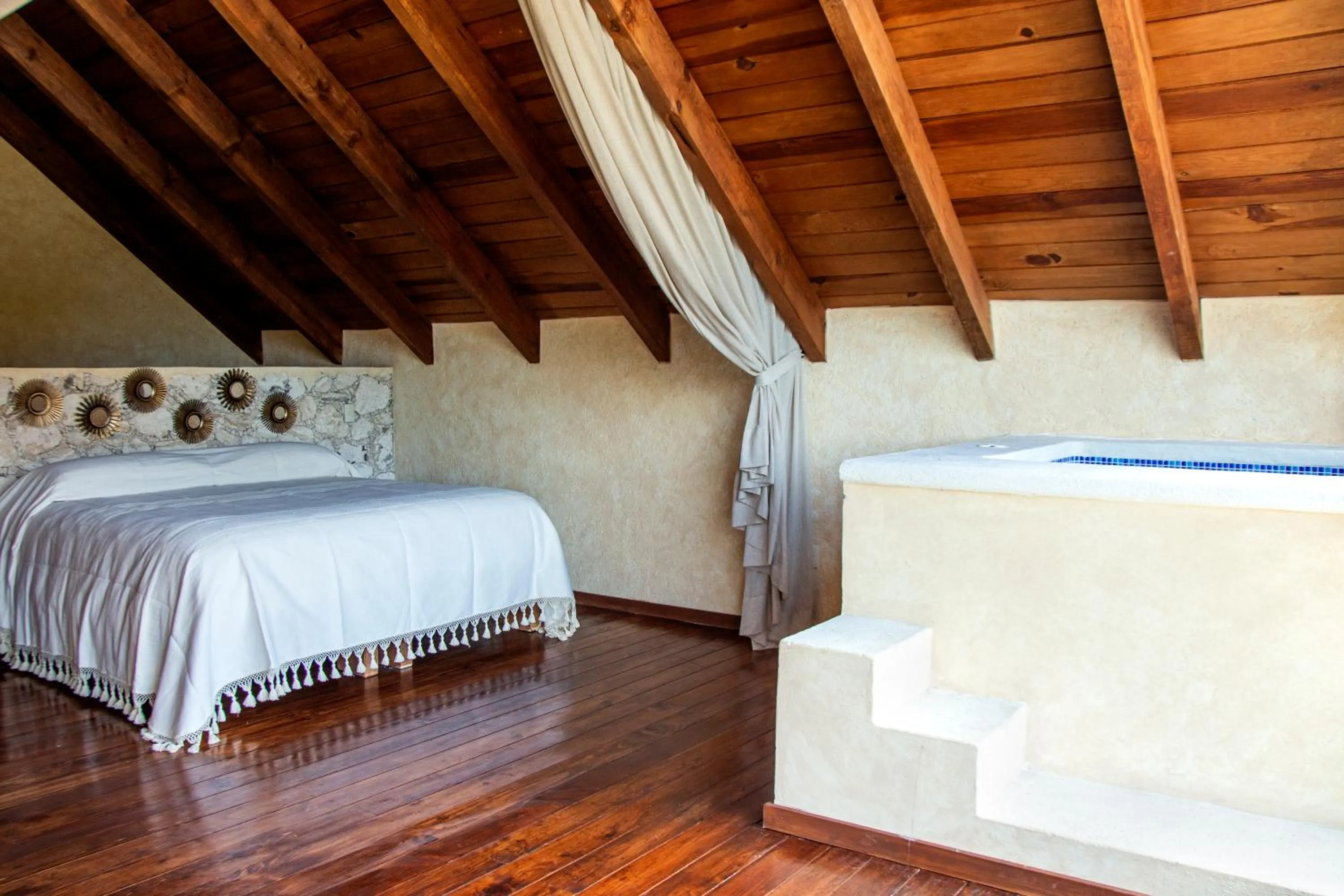 Bed in Zidada Hotel and Chalets