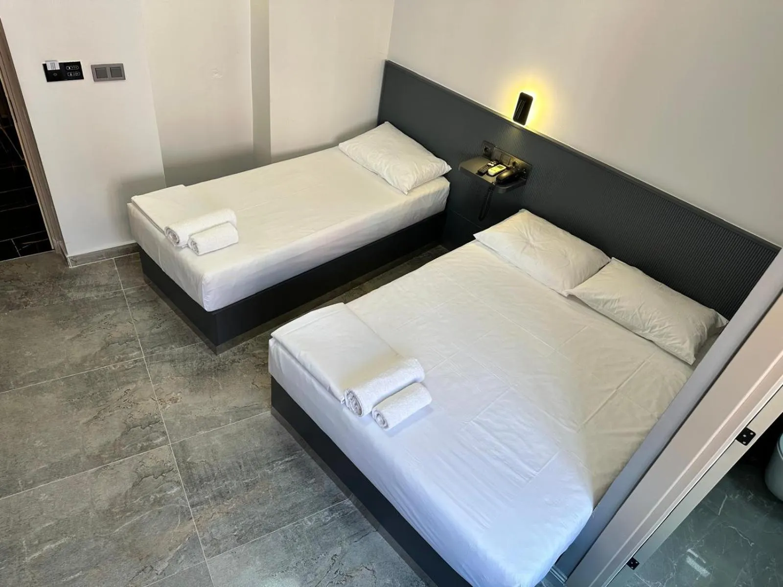 Bed in Grand FM Hotel