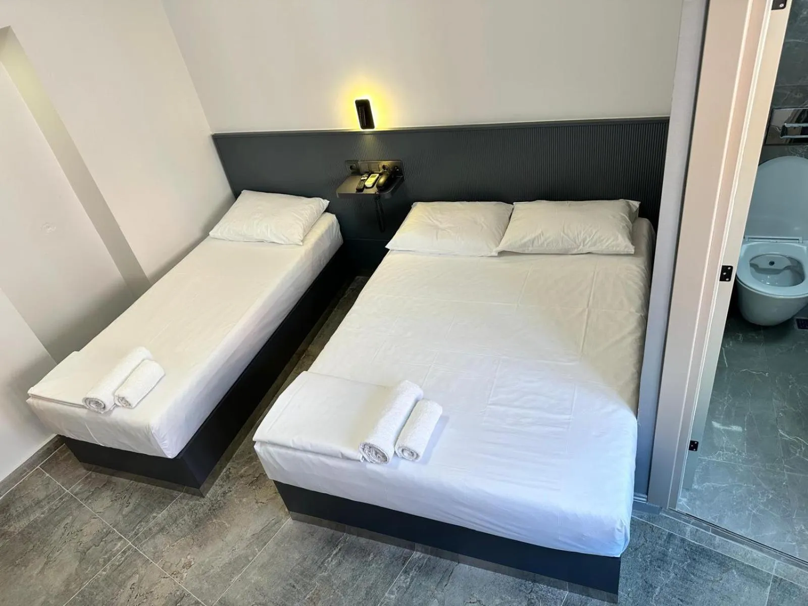 Bed in Grand FM Hotel