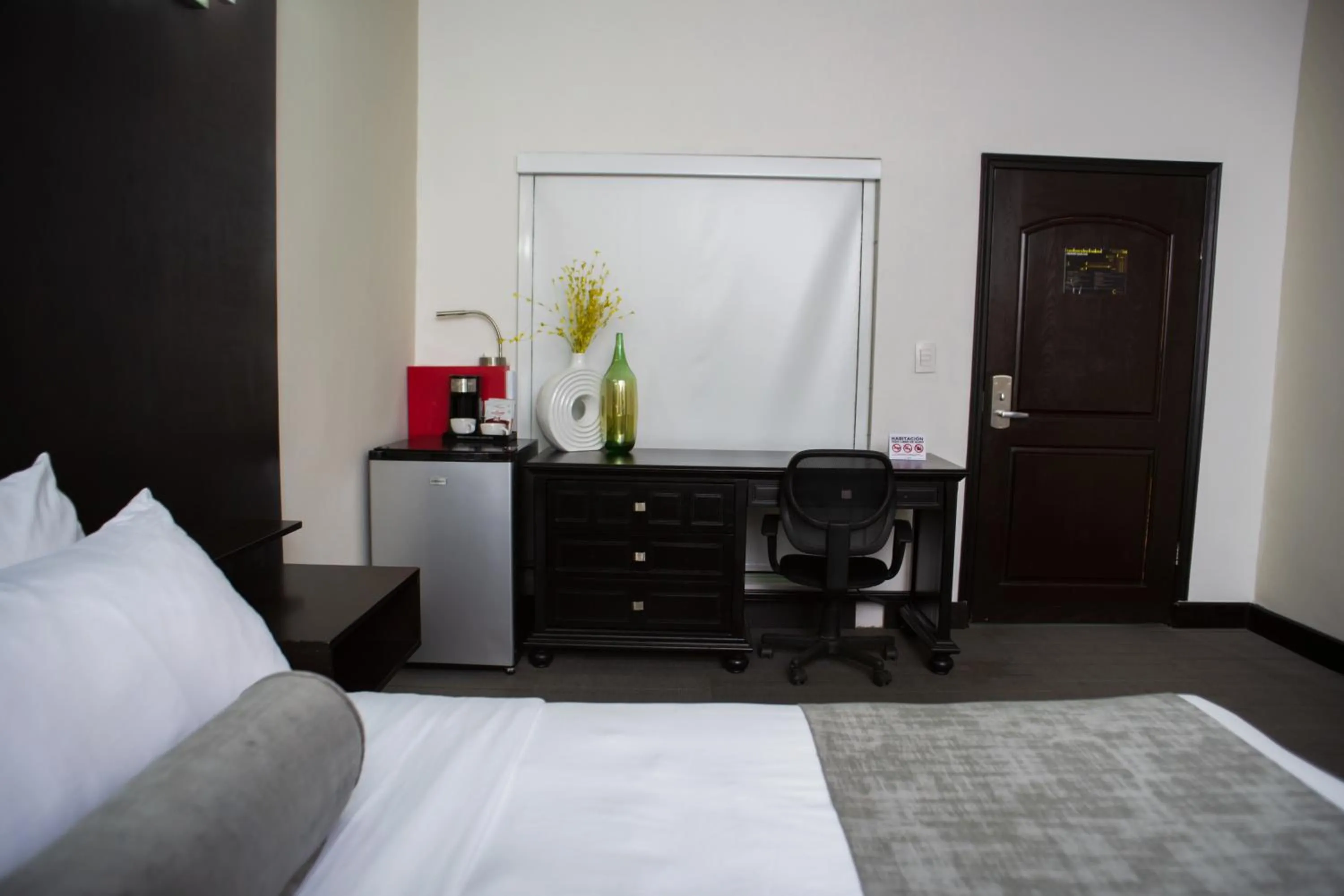 Bed in Stay Inn Hotels