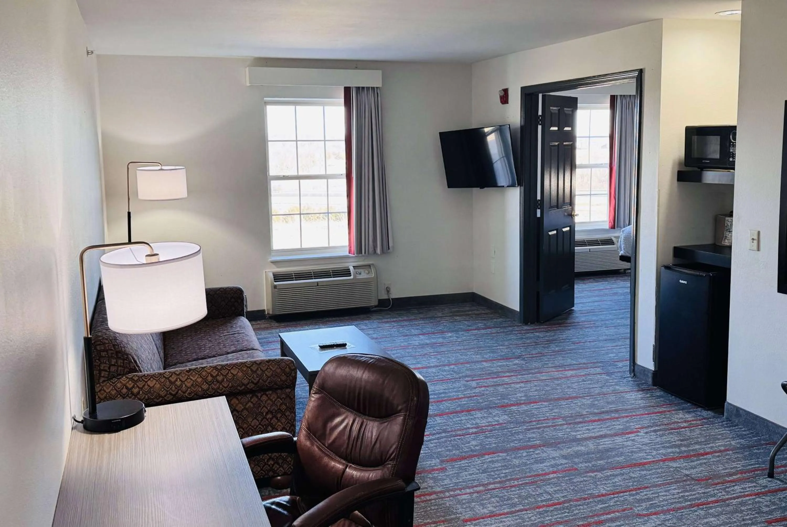 Photo of the whole room, Bed in Ramada by Wyndham Sparta/At Speedway