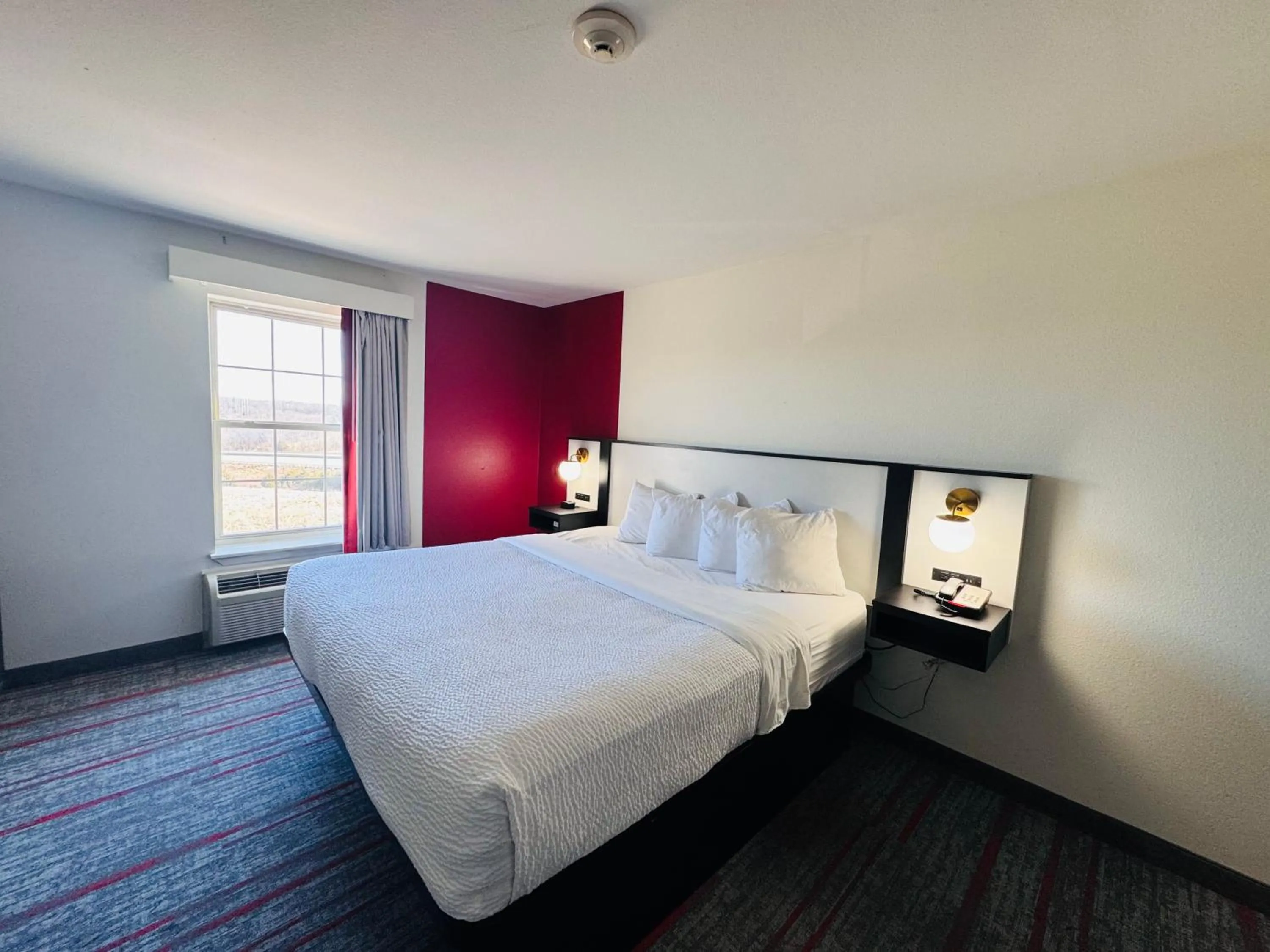 Bed in Ramada by Wyndham Sparta/At Speedway