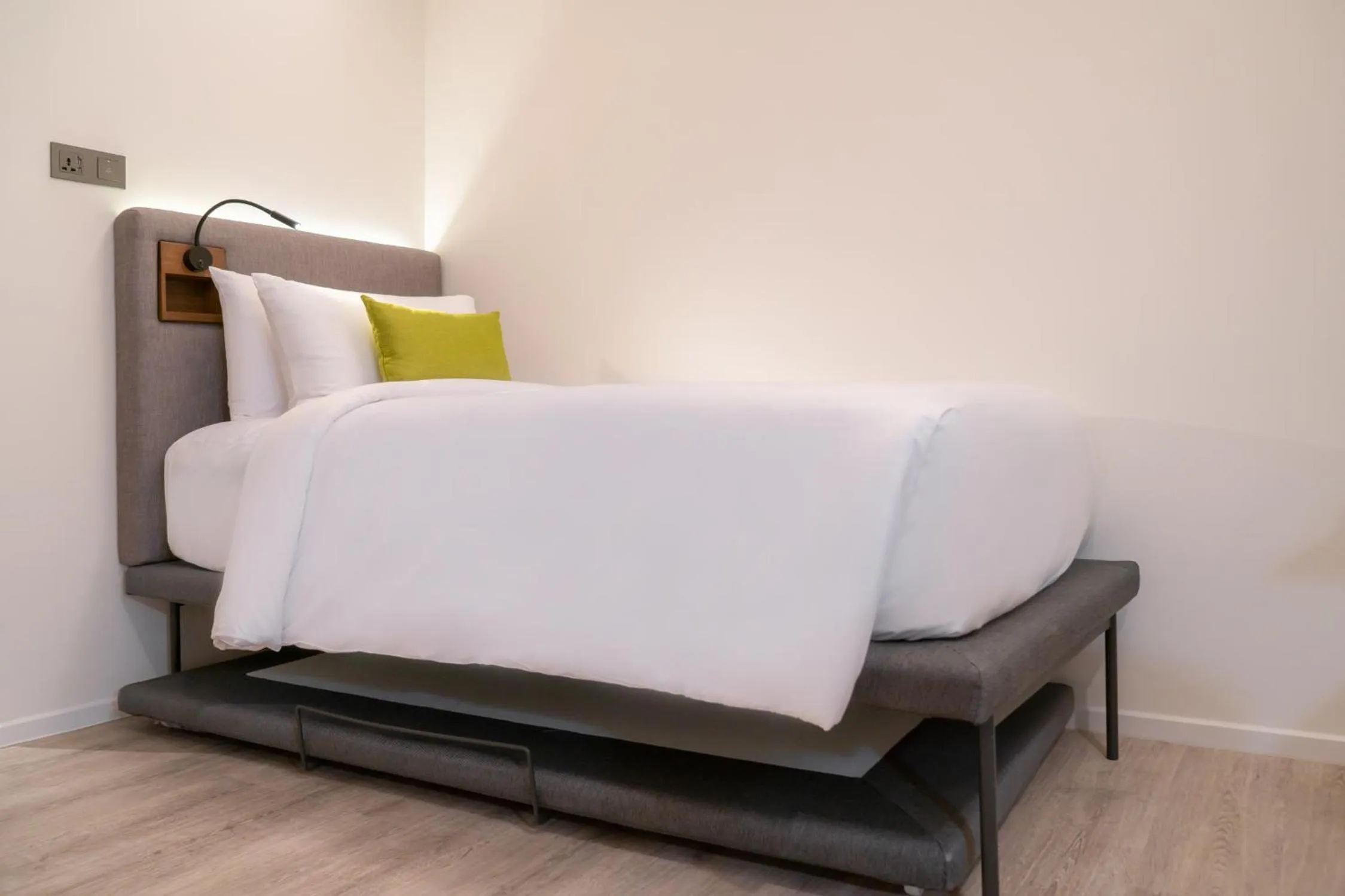 Bed in Triple Y Hotel