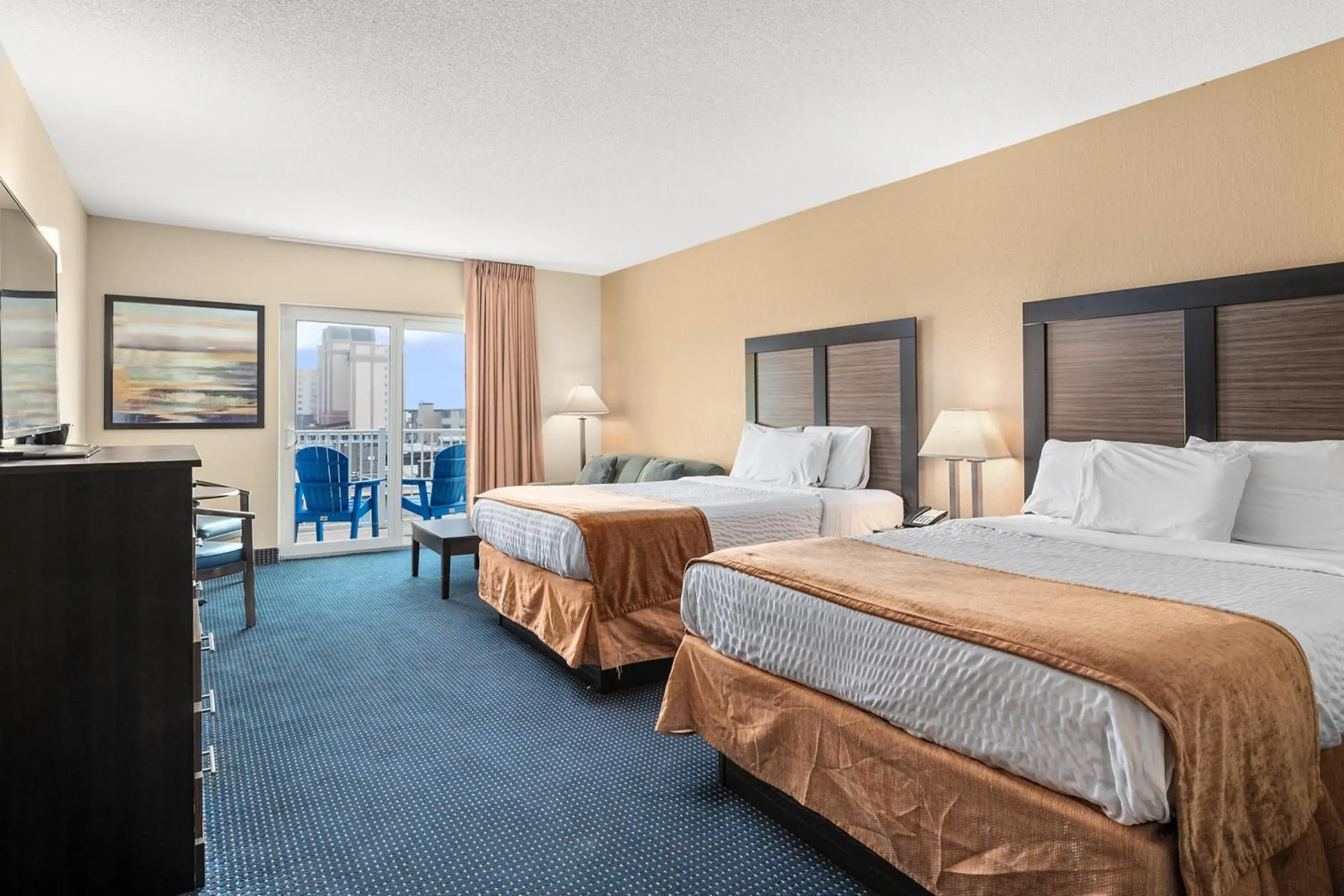 Queen Room with Two Queen Beds and Sofa - Partial Ocean View in Crystal Beach Hotel Queen Room with Two Queen Beds and Sofa - Partial Ocean View in Crystal Beach Hotel