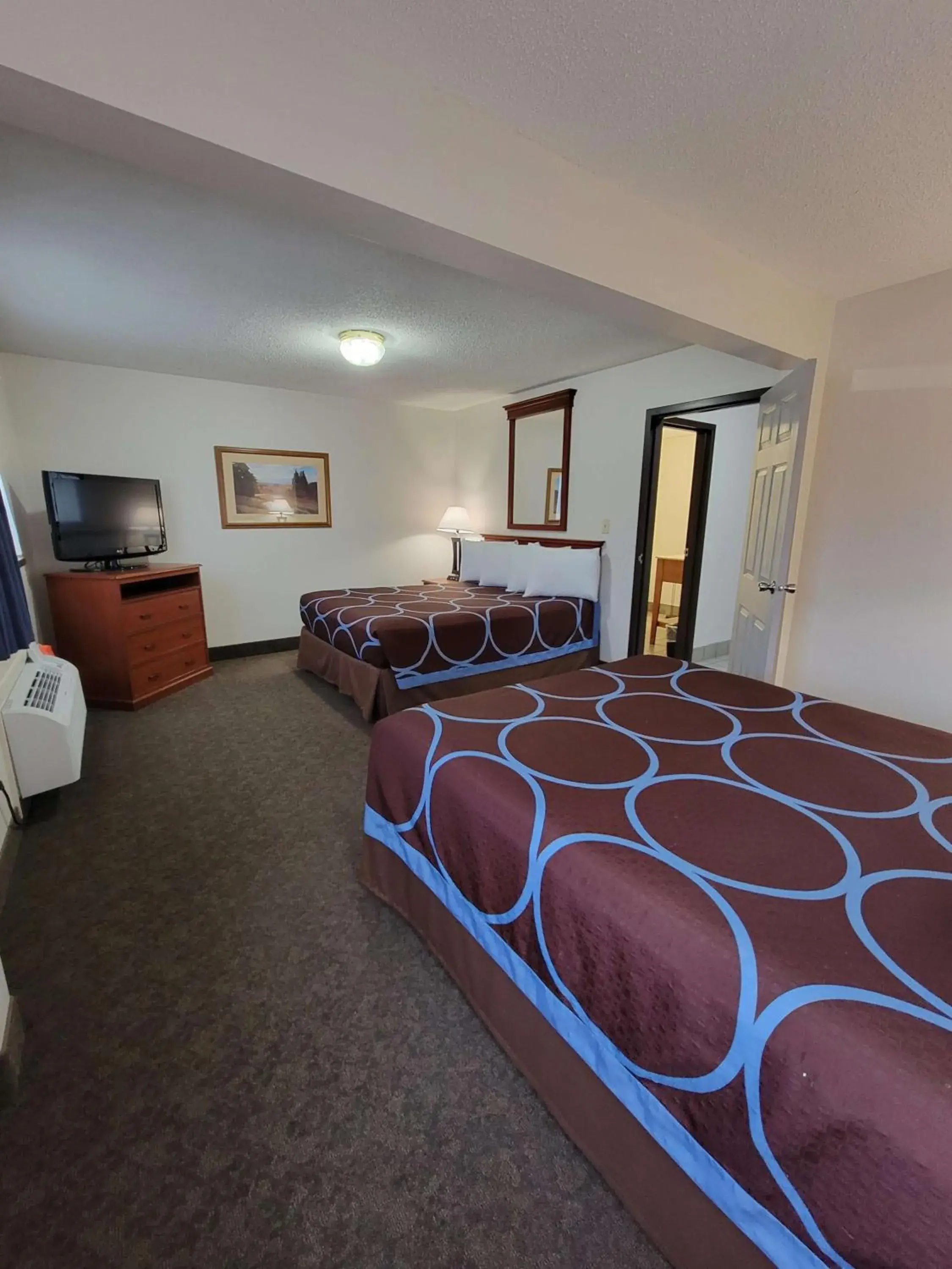 Queen Room with Three Queen Beds - Non-Smoking in SureStay Plus Hotel by Best Western Grand Island Queen Room with Three Queen Beds - Non-Smoking in SureStay Plus Hotel by Best Western Grand Island