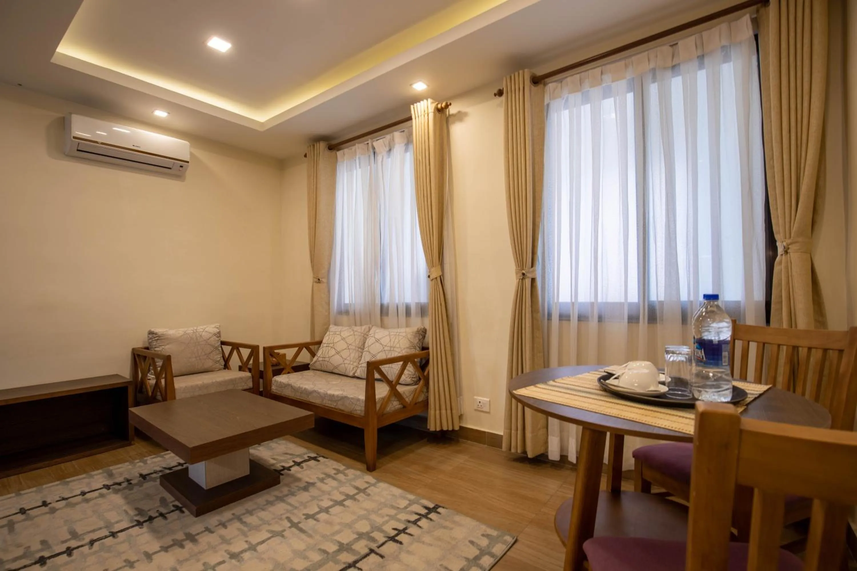 Living room, Bed in Sarovar Residency Serviced Apartment Hotel