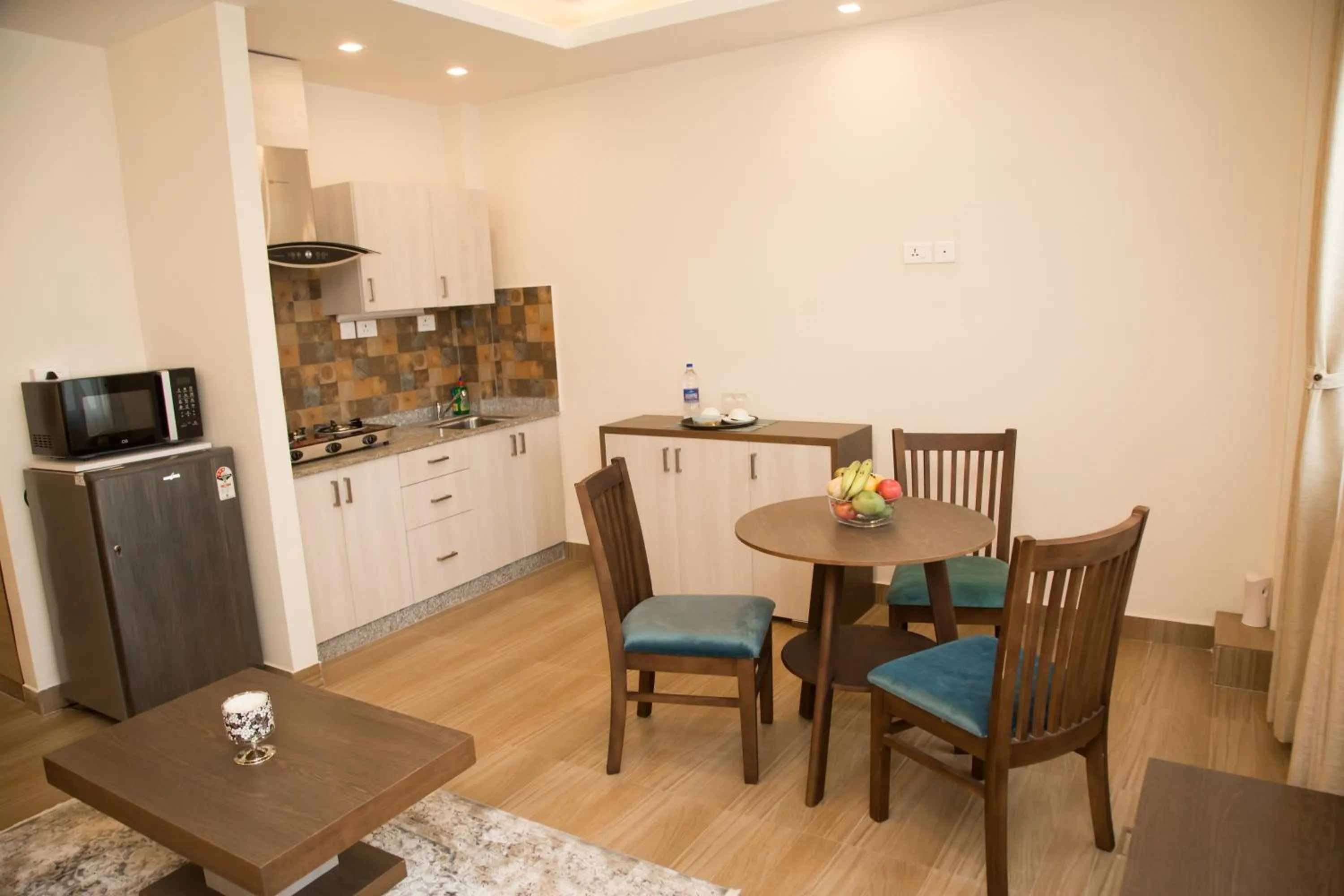 Kitchen or kitchenette in Sarovar Residency Serviced Apartment Hotel