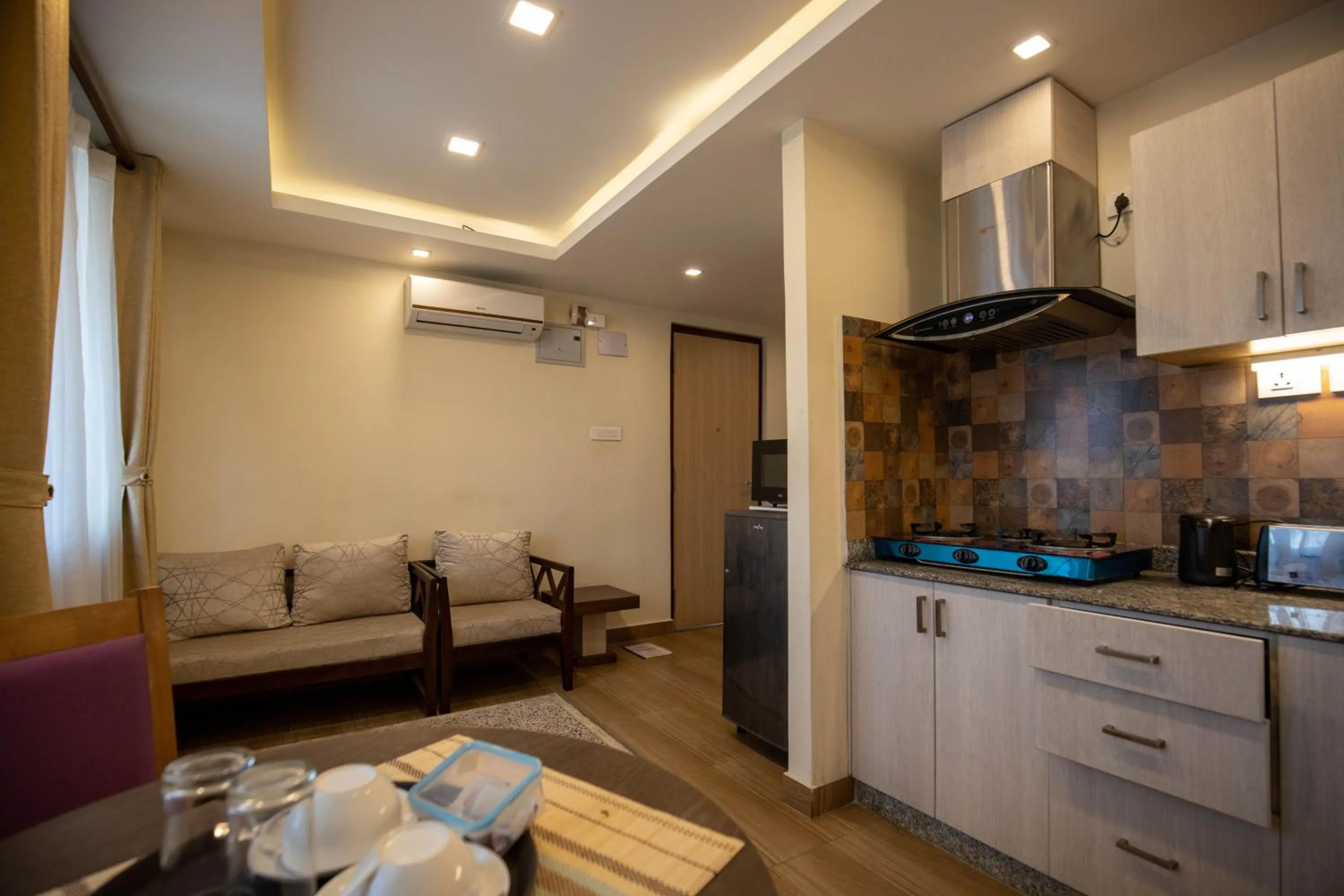 Kitchen or kitchenette in Sarovar Residency Serviced Apartment Hotel
