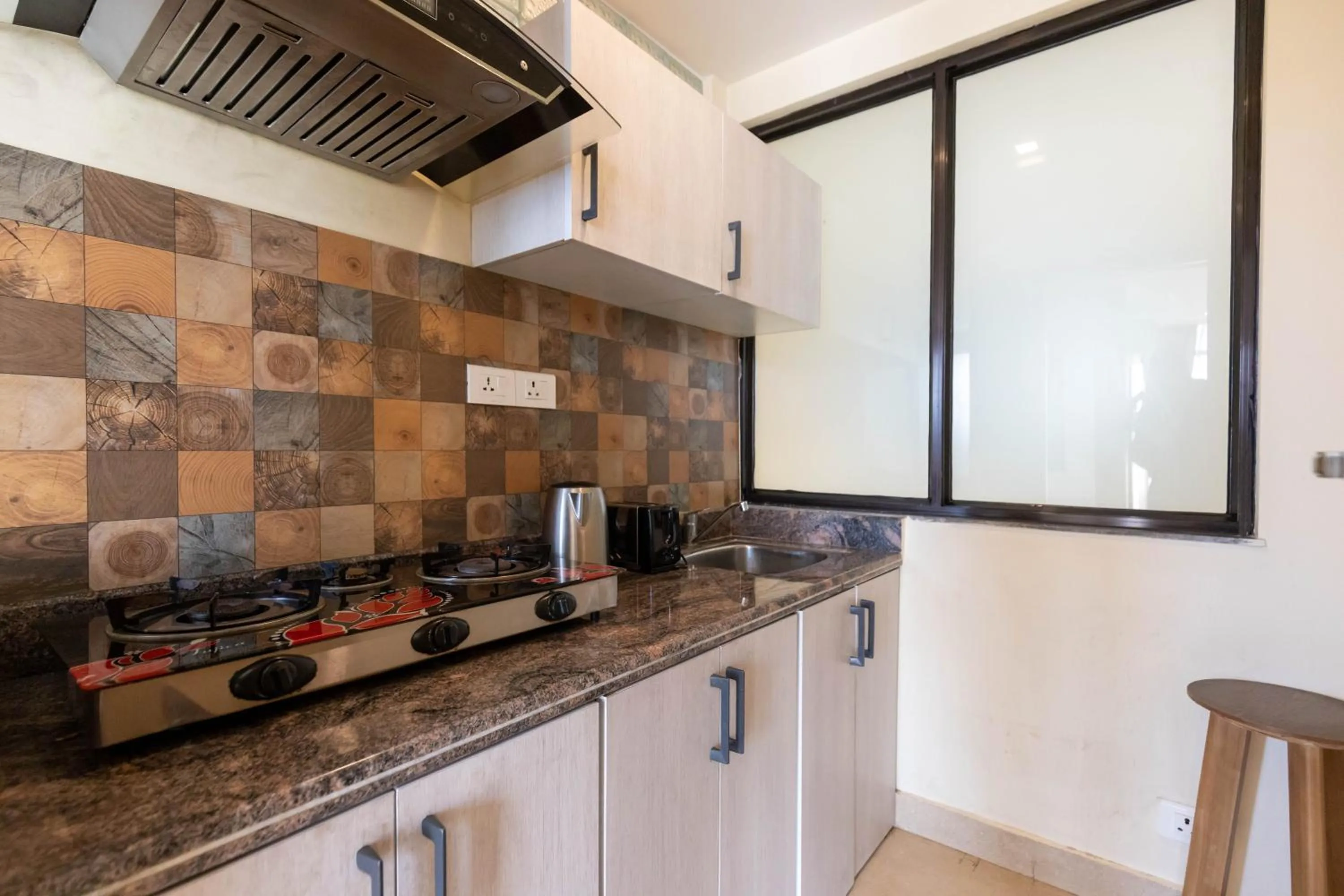 Kitchen or kitchenette in Sarovar Residency Serviced Apartment Hotel