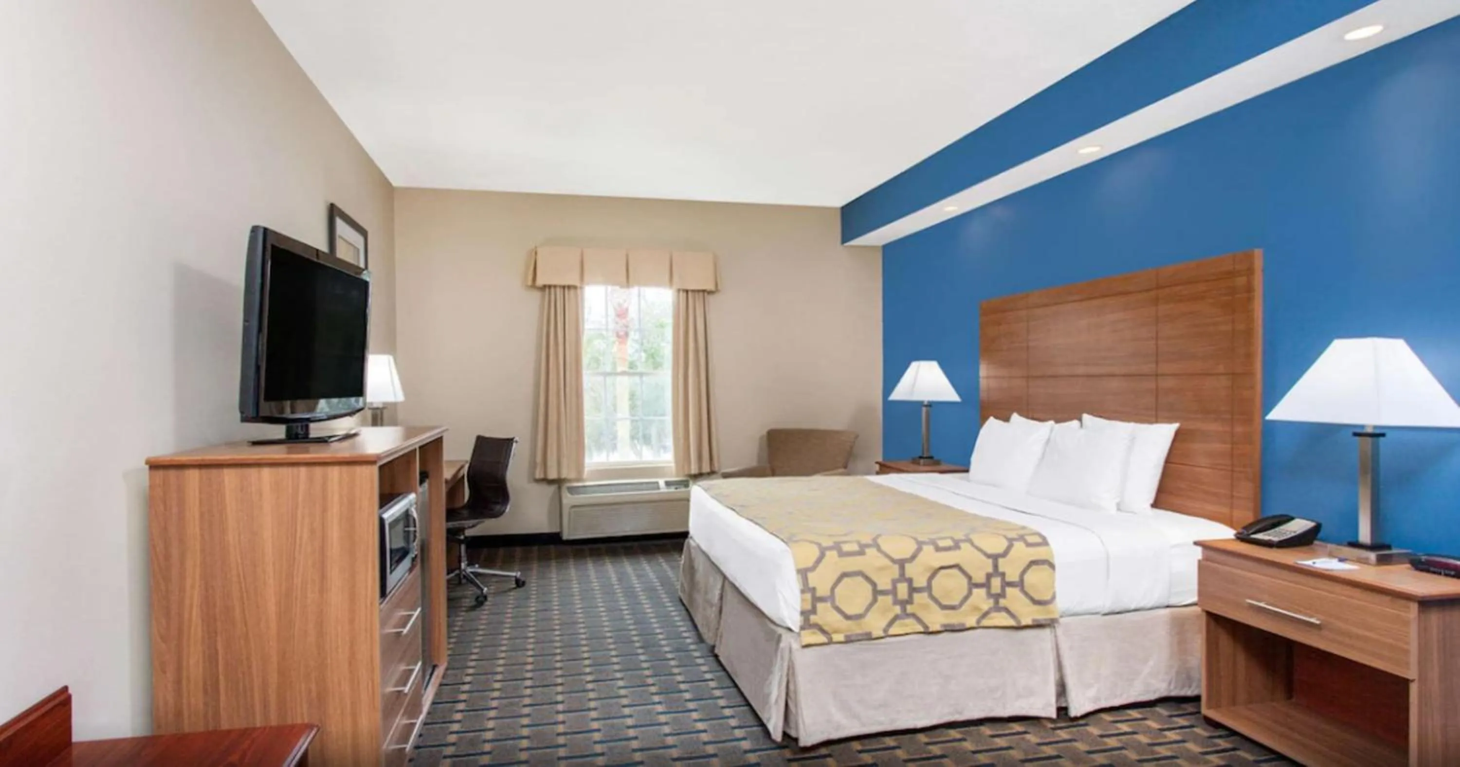 Bed in Baymont by Wyndham Jacksonville/Butler Blvd