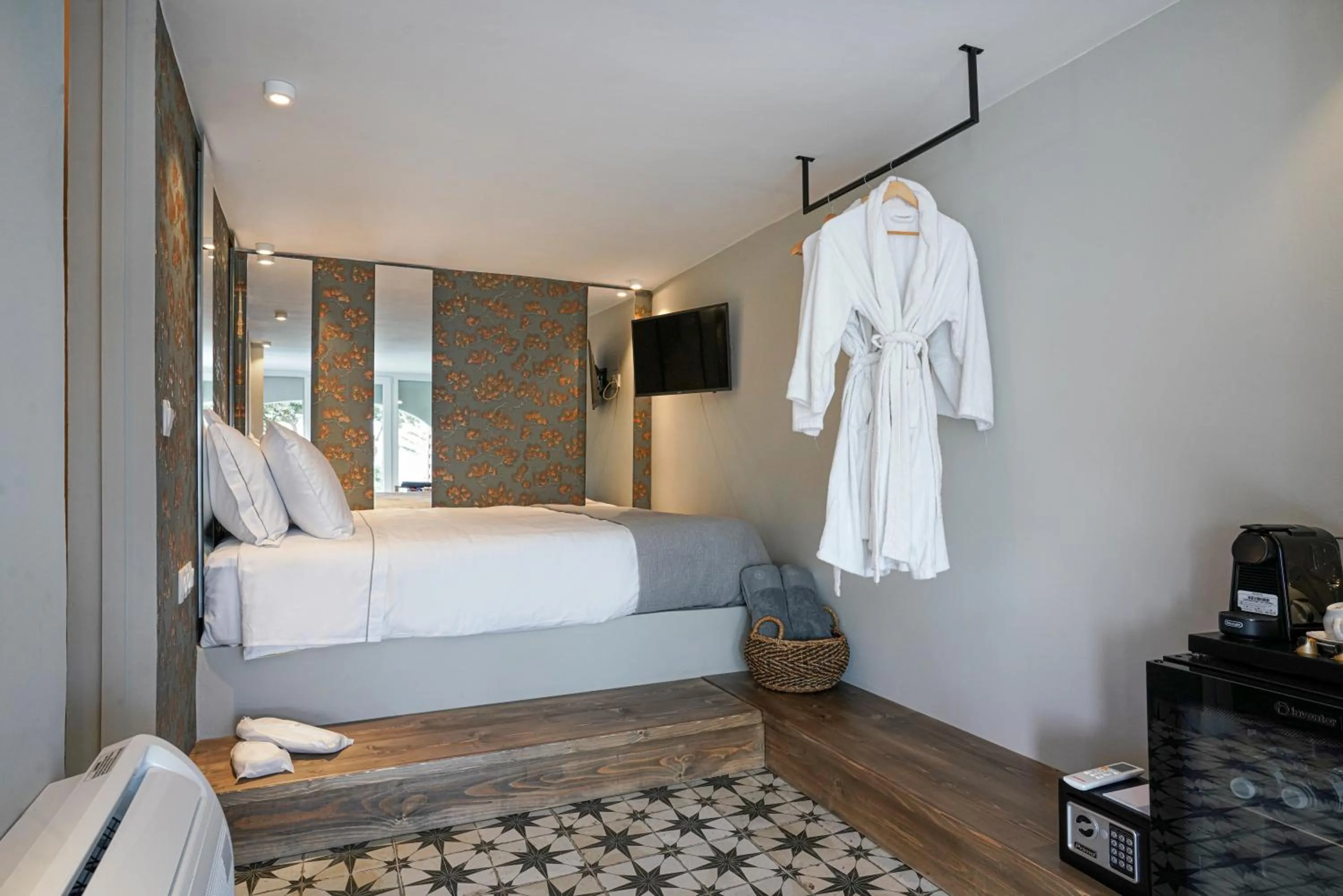 Bed in Pafsilipon Suites