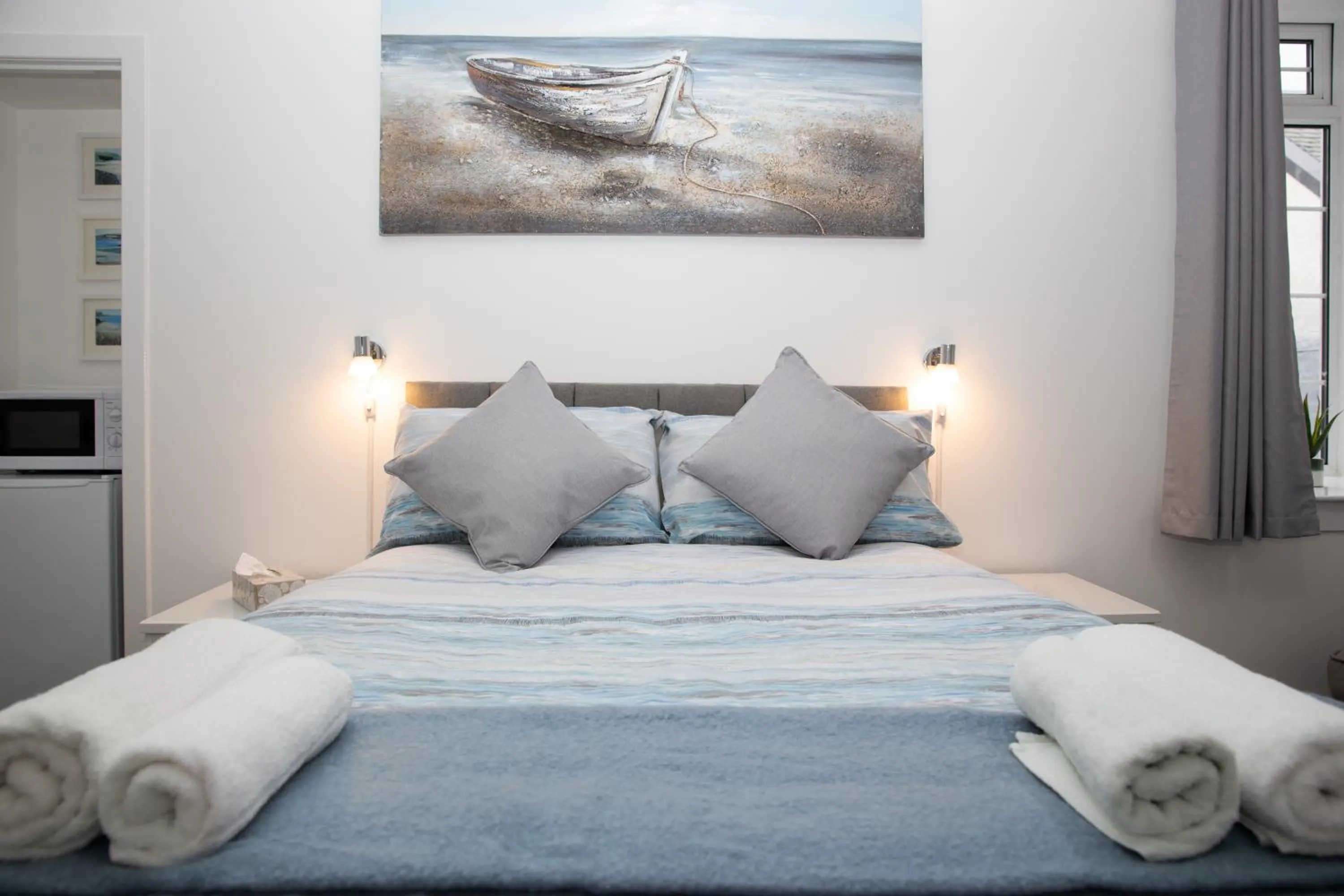 Bed in Marina View Guest House