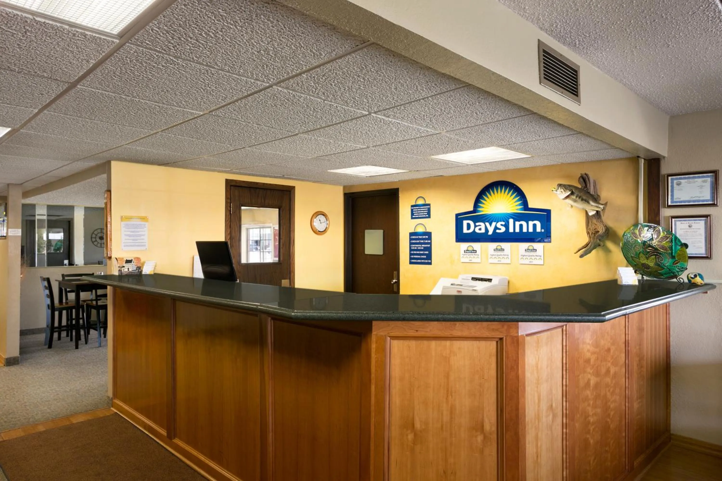 Property logo or sign in Days Inn by Wyndham Pierre