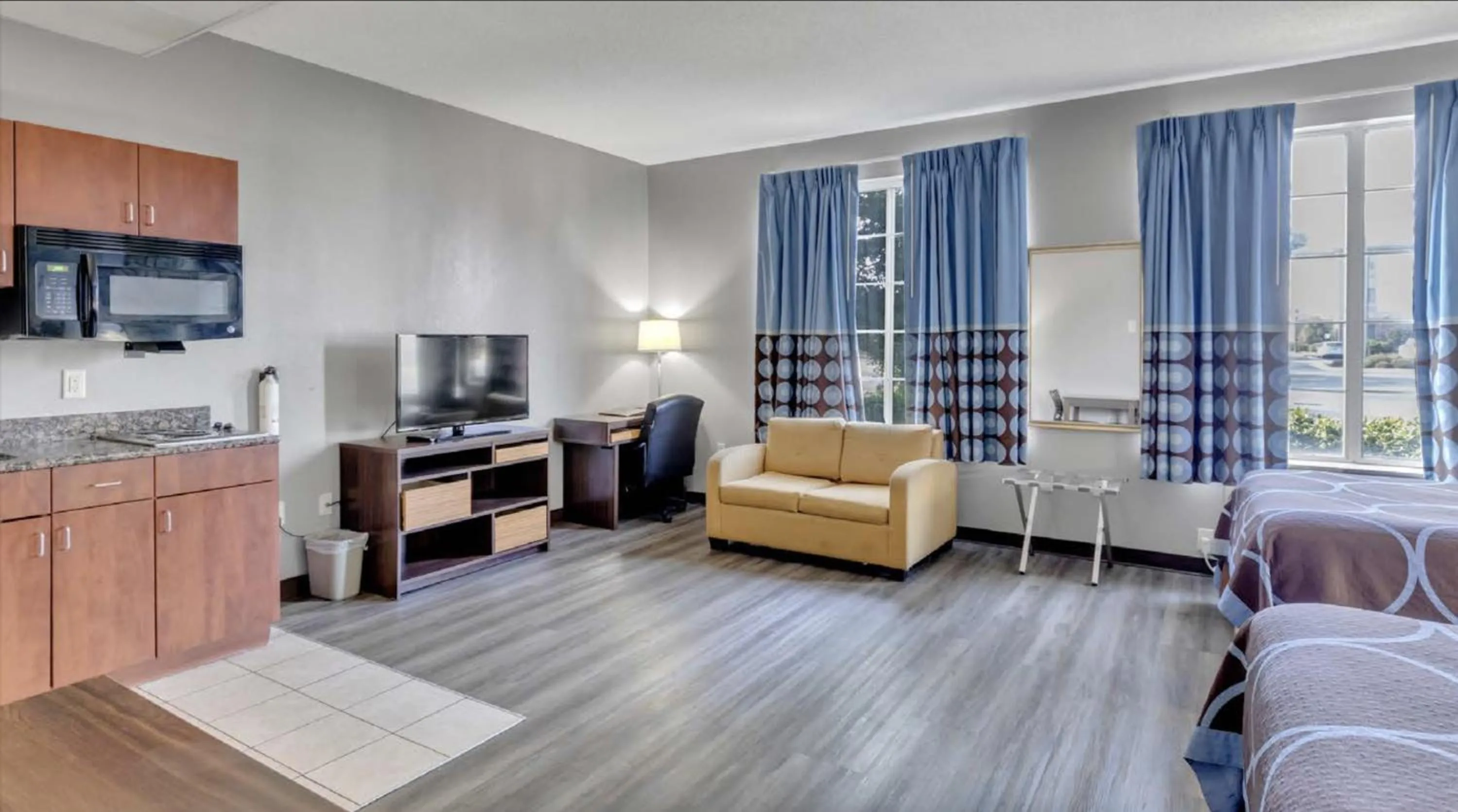 Living room in Super 8 by Wyndham Smithfield-Selma