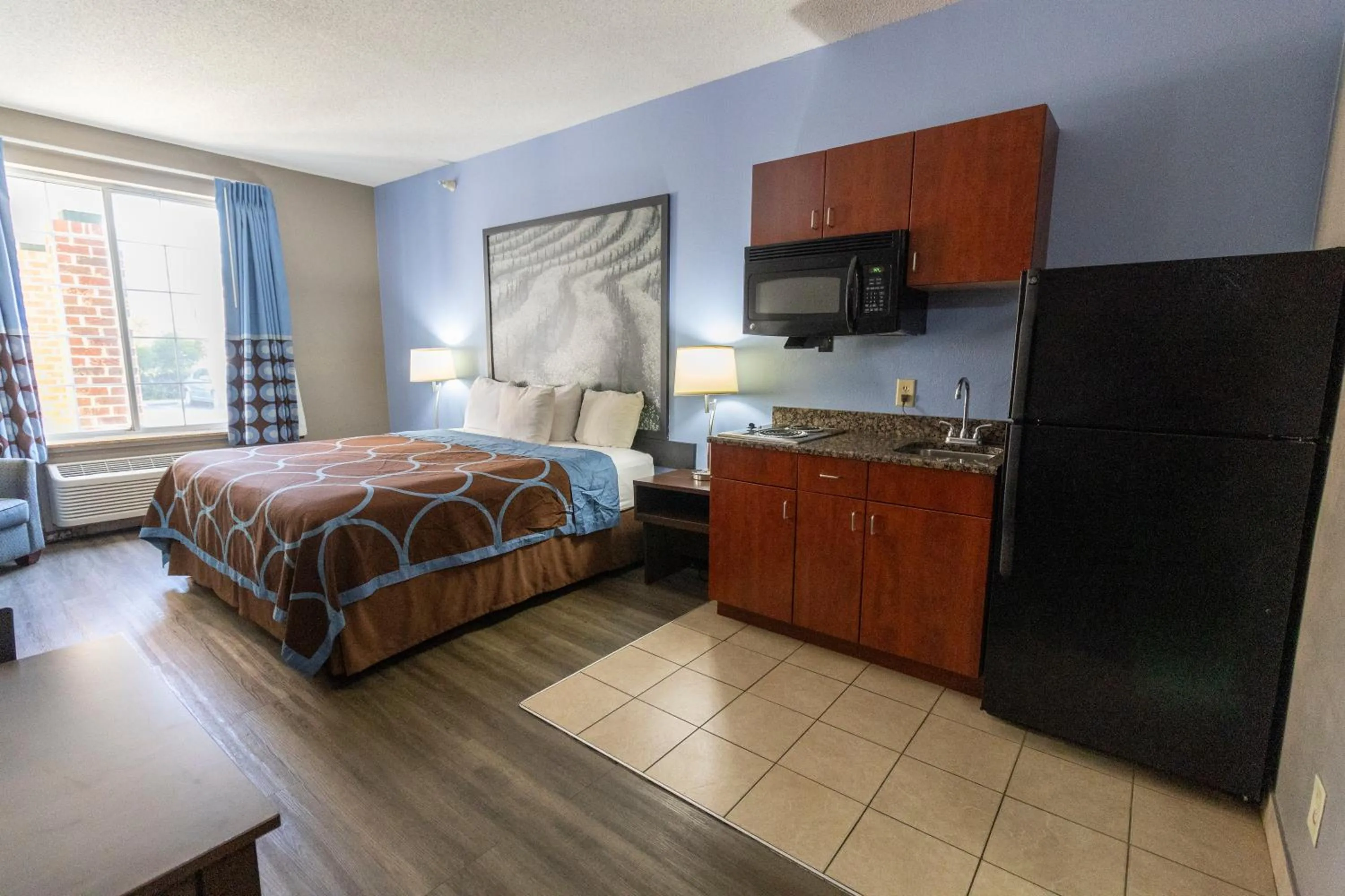 Bed in Super 8 by Wyndham Smithfield-Selma