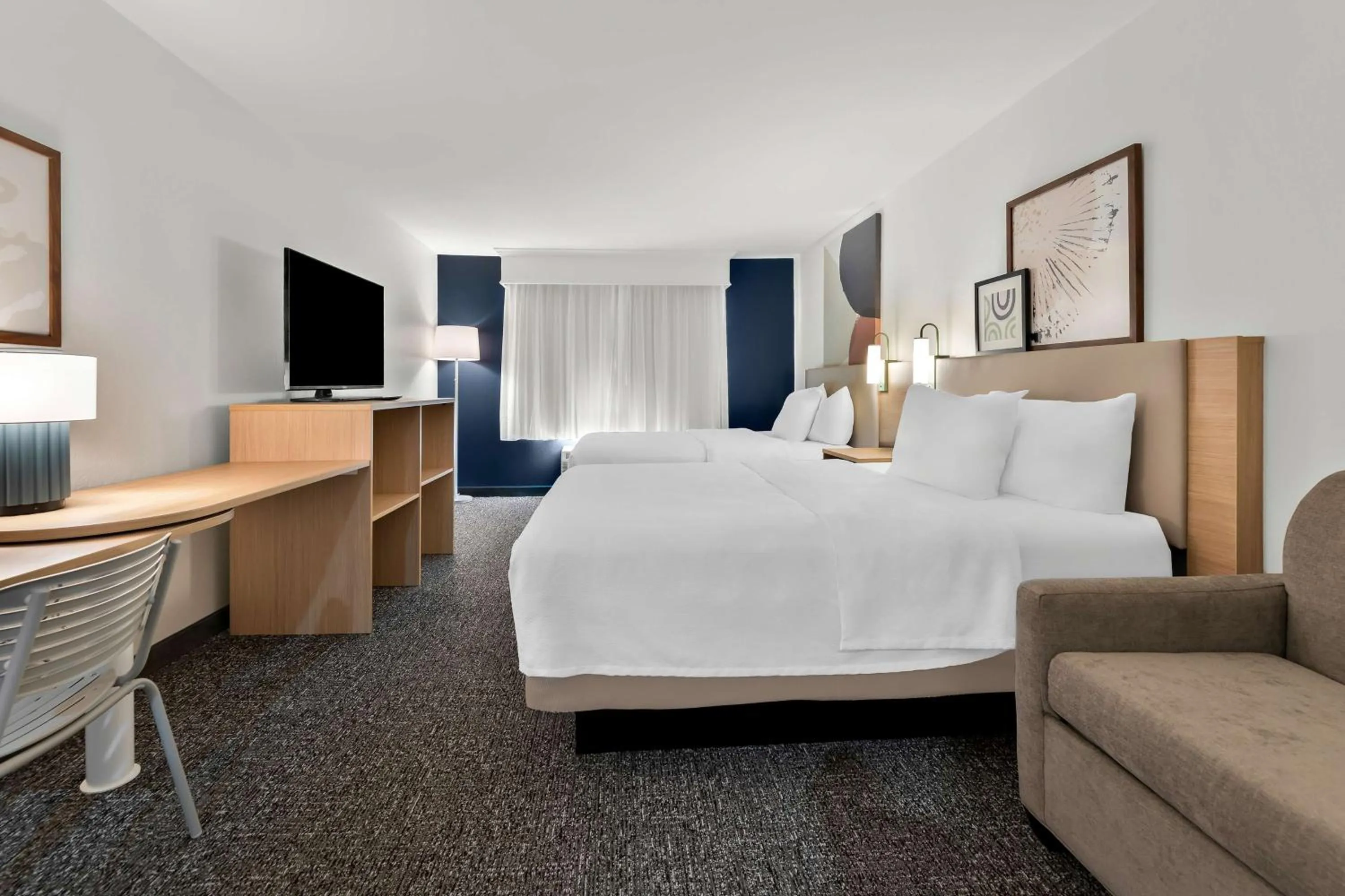 Living room, Bed in Wingate by Wyndham Tupelo