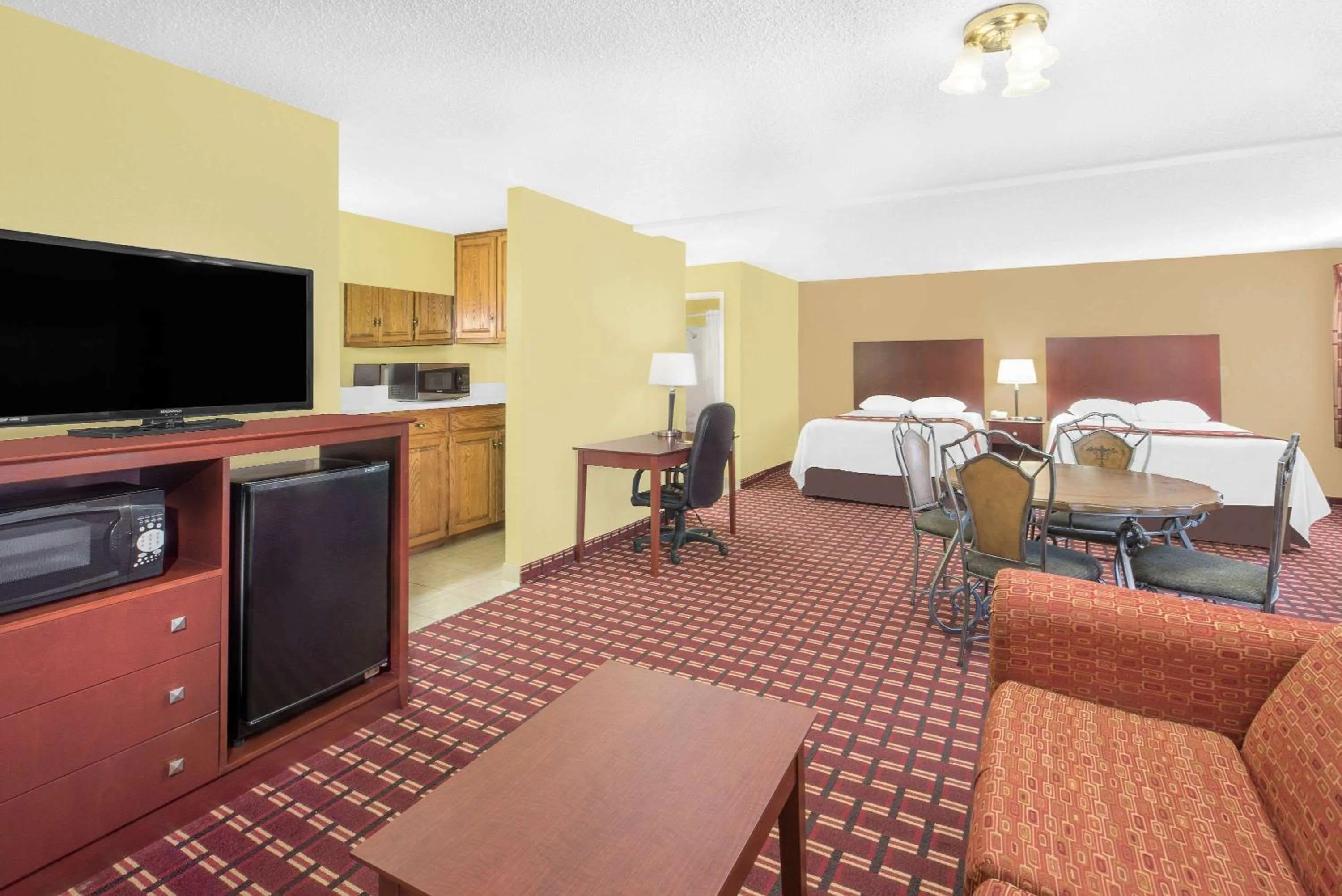 Photo of the whole room, Bed in Super 8 by Wyndham Kerrville TX