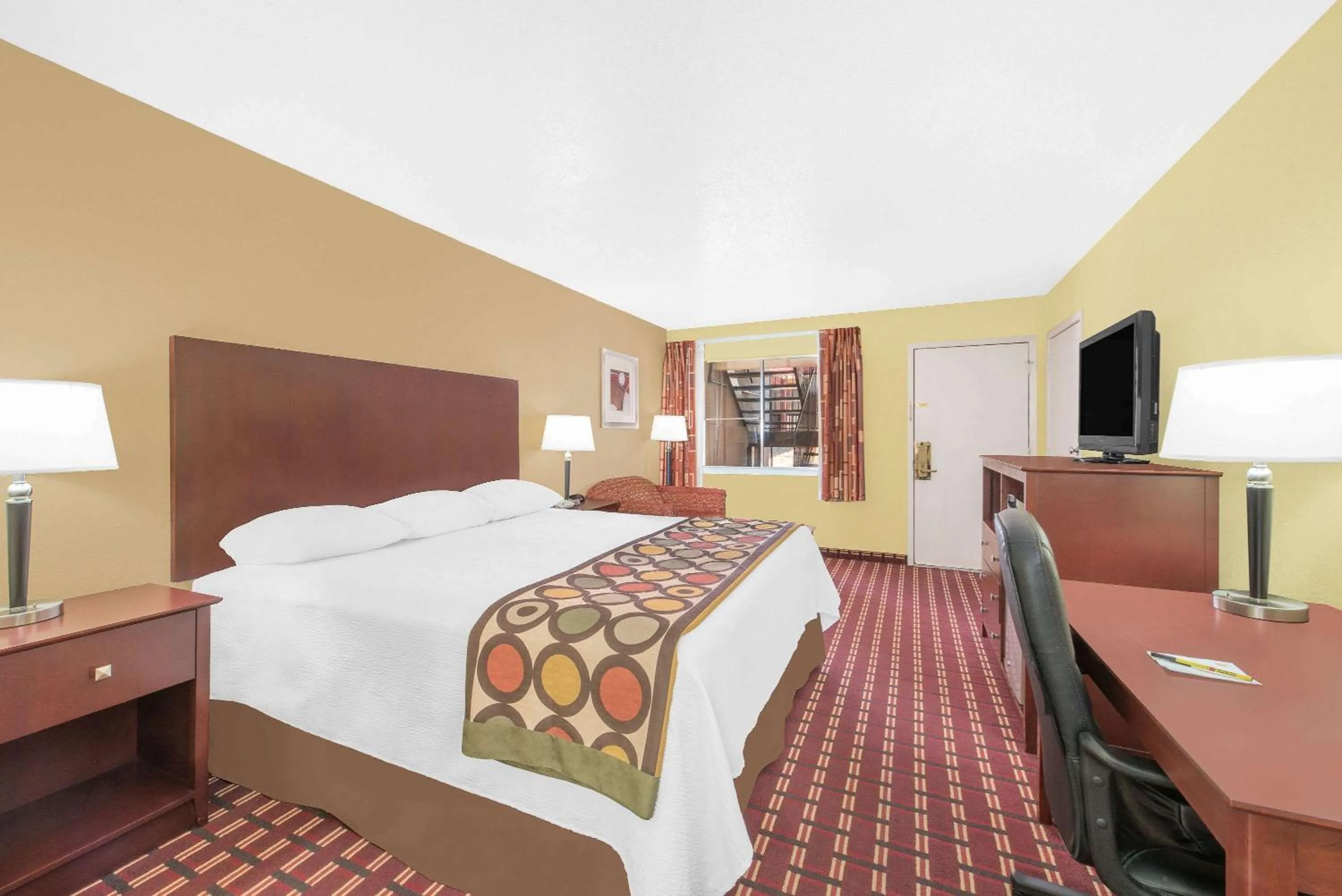 Photo of the whole room, Bed in Super 8 by Wyndham Kerrville TX