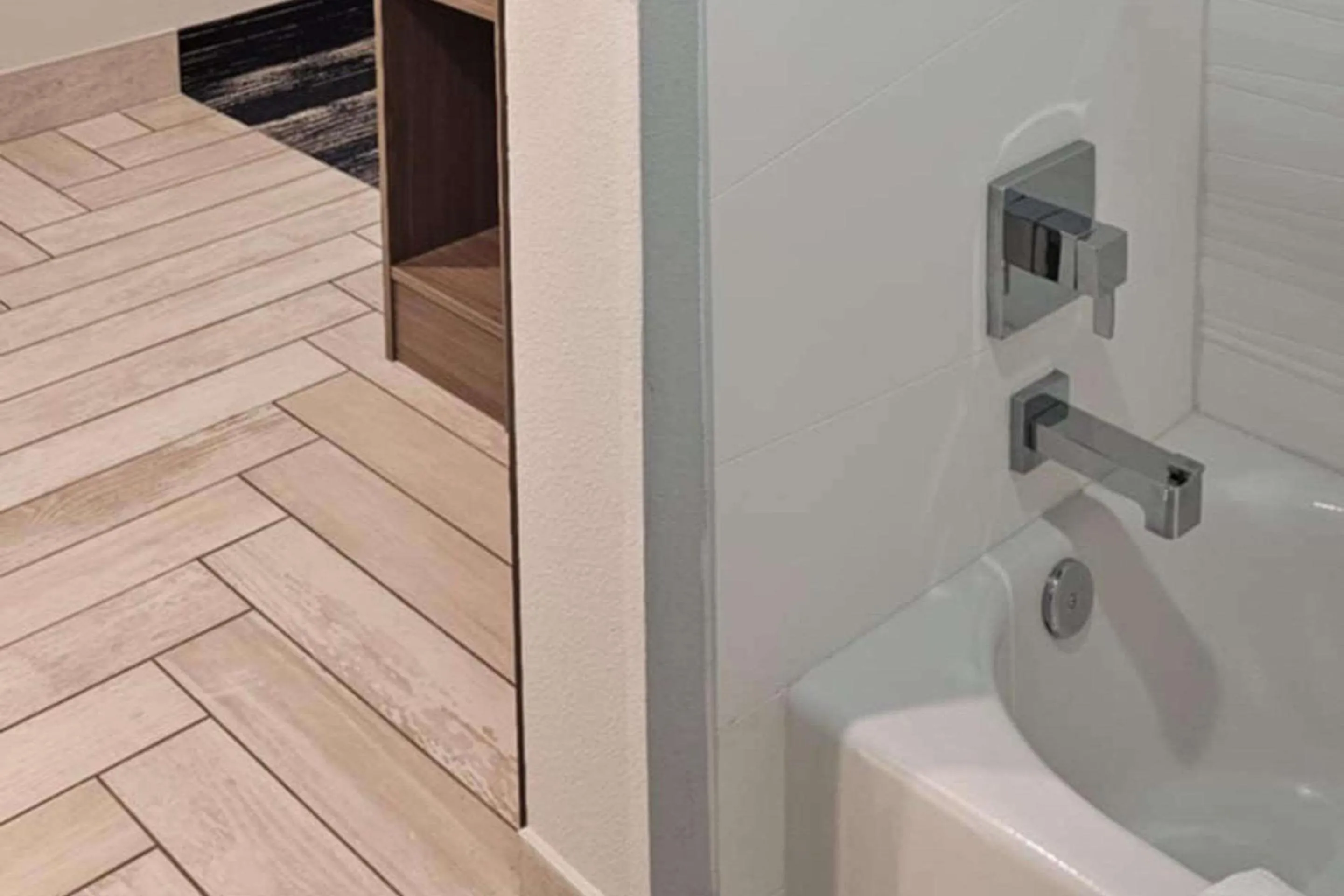 Bedroom in Edgewater Inn and Suites, an Ascend Collection Hotel