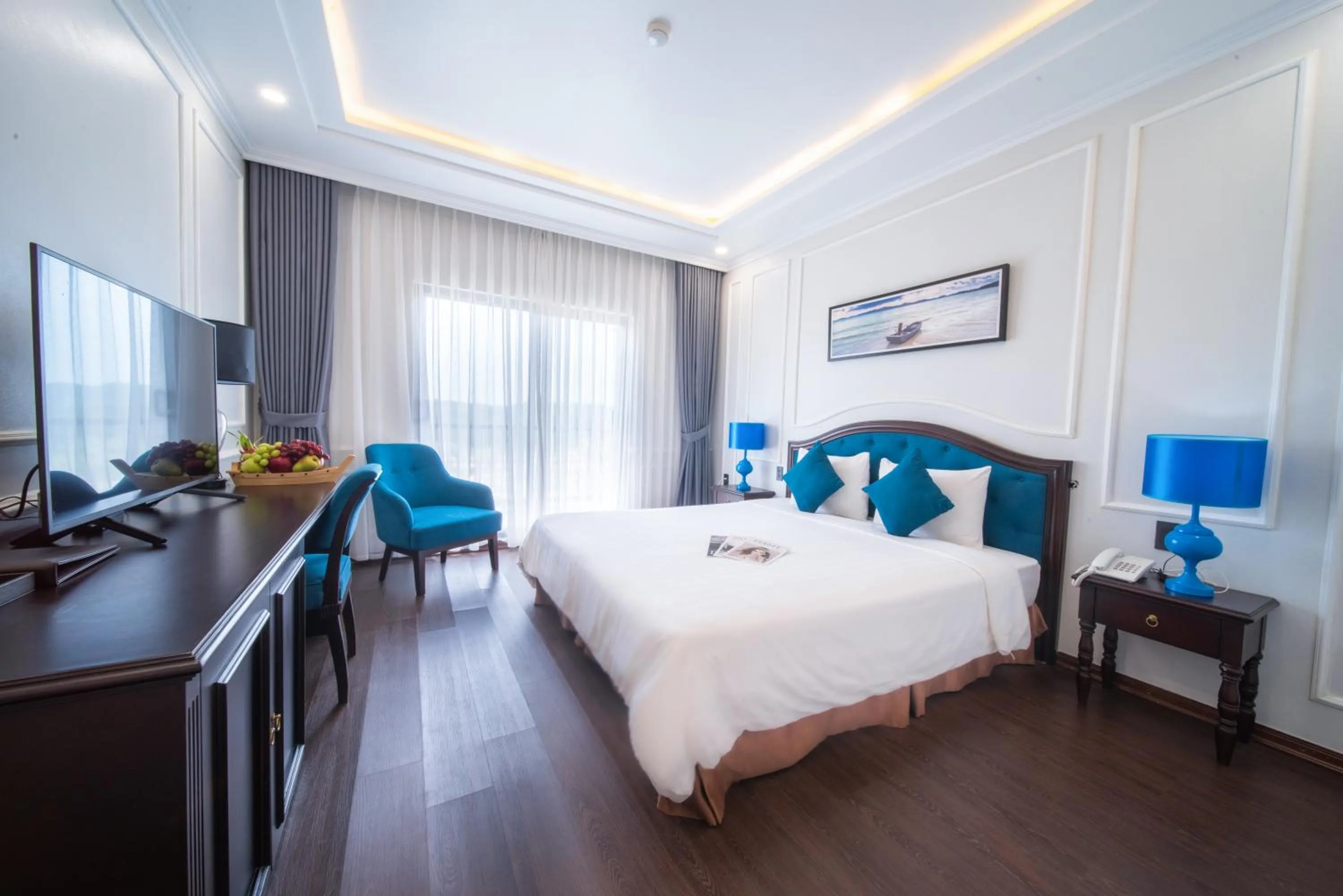 TV and multimedia, Bed in Minh Chau Pearl Hotel & Spa - Quan Lan Island