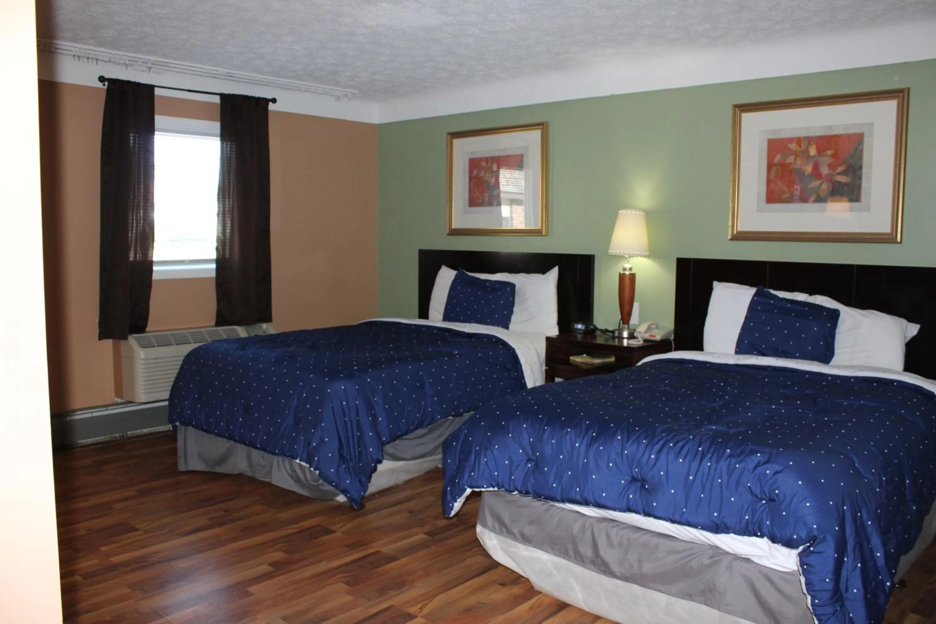 Bed in Bellevue Hotel and Suites