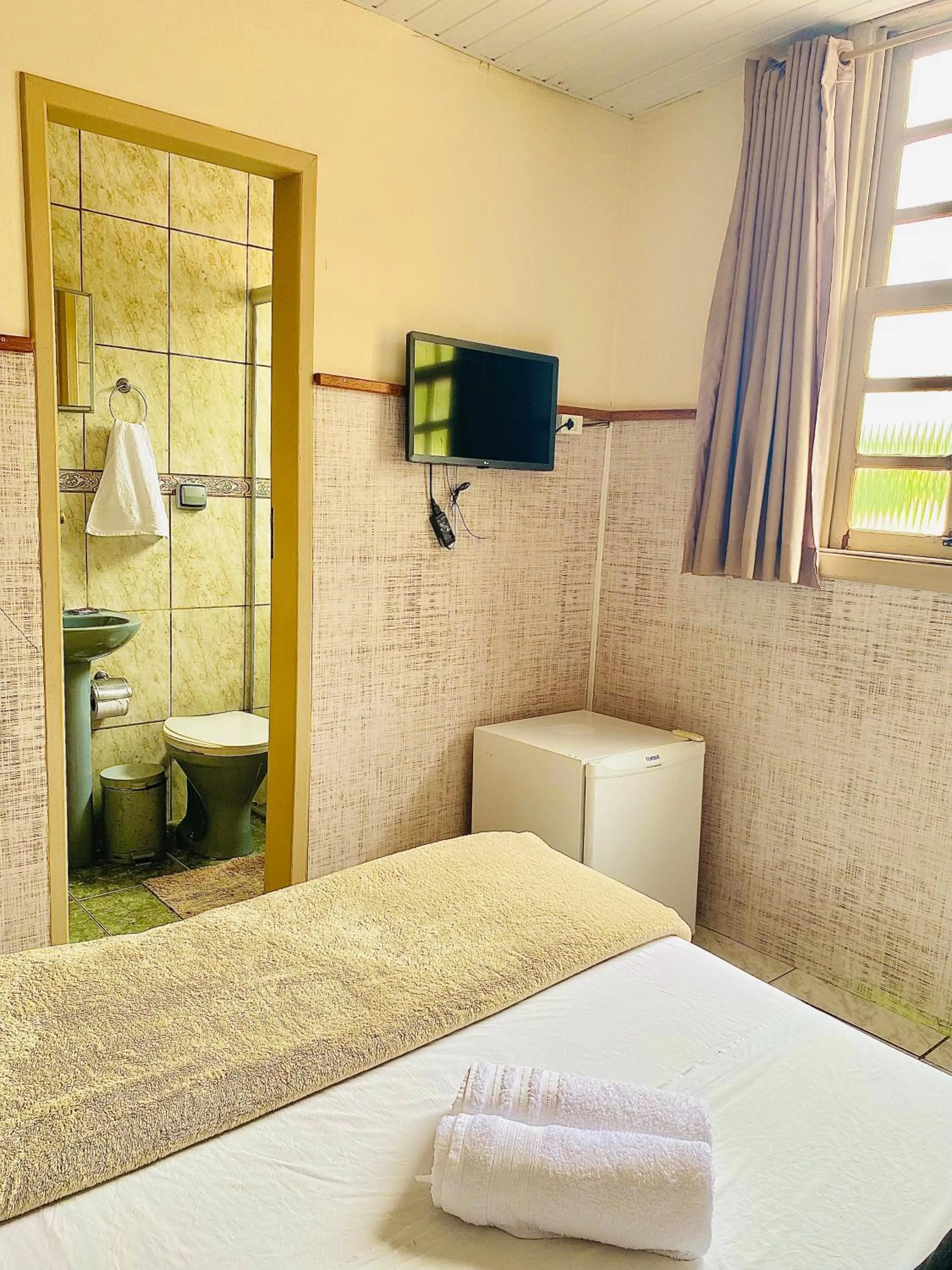 Photo of the whole room, Bed in Hospedaria Vila Rica - 1 km do centro histórico