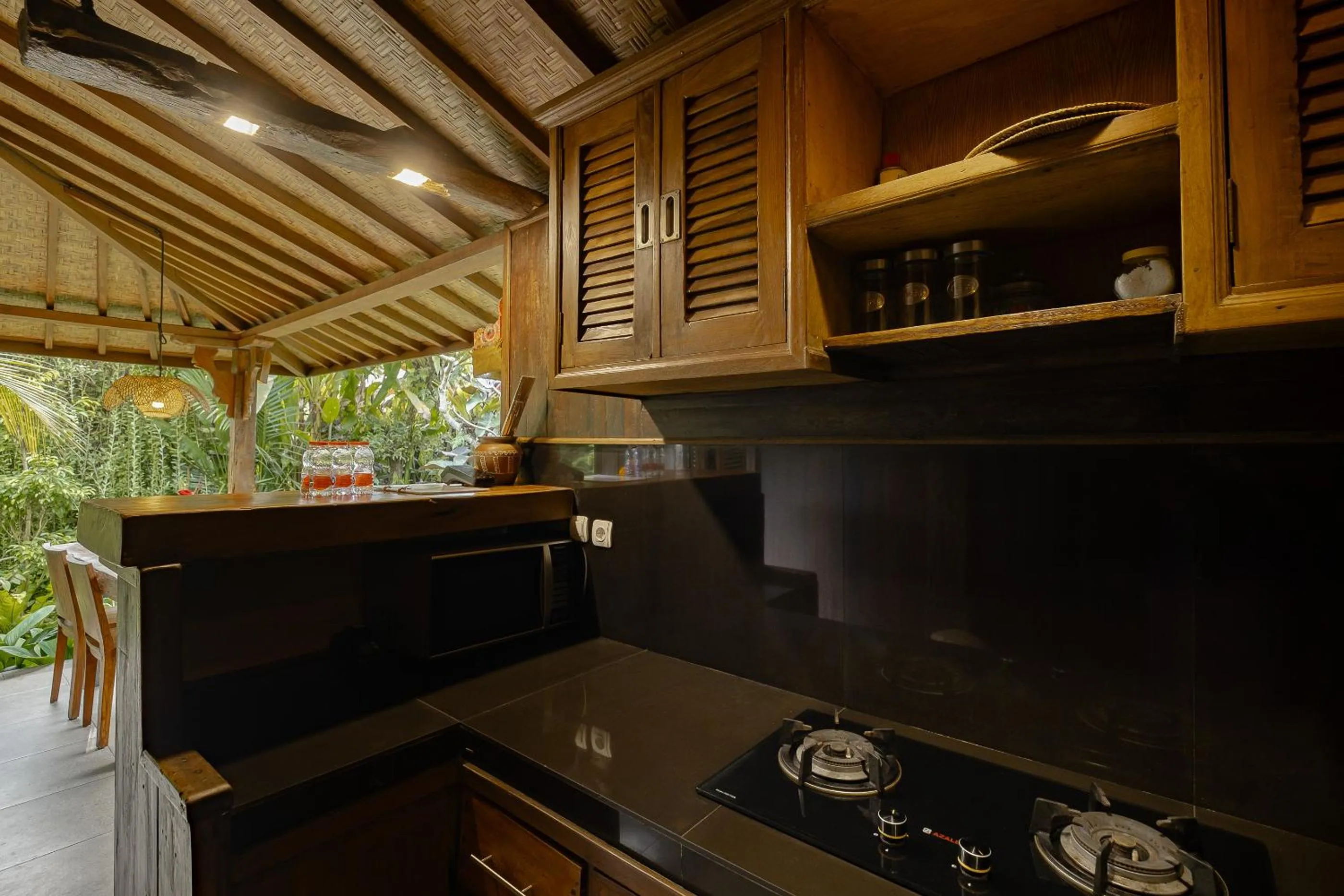 Kitchen or kitchenette in Moringa Ubud Villa