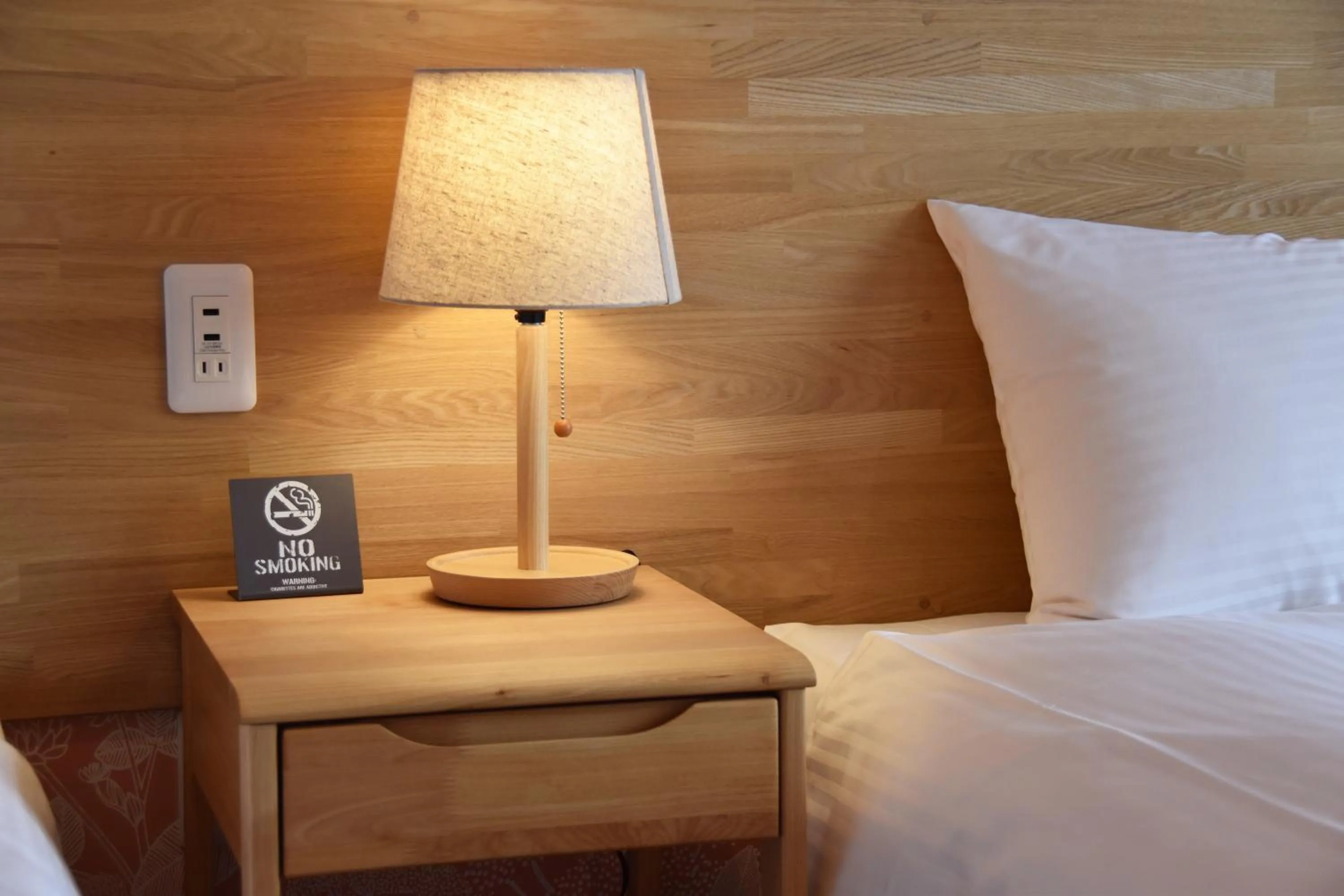 Decorative detail, Bed in Hotel Hanafuji Inn