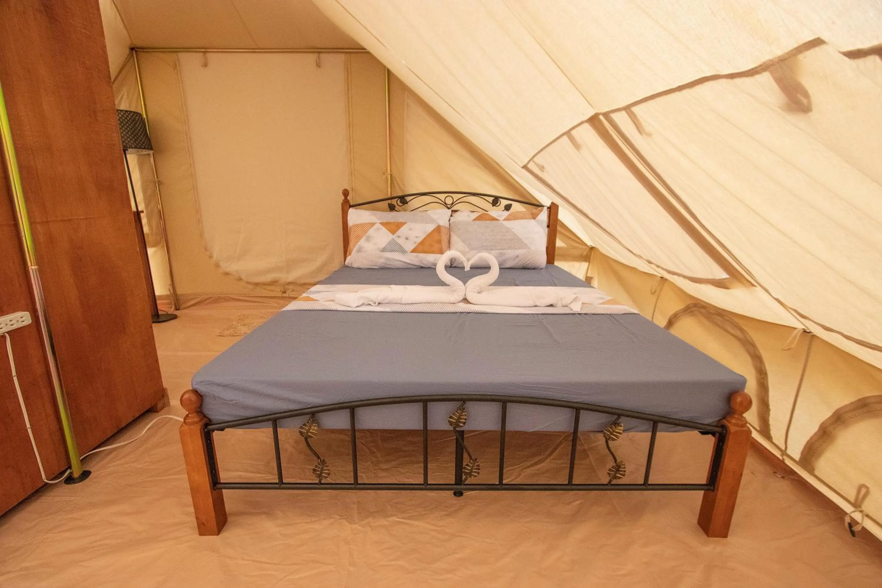 Bed in The Acacia Glamping Park